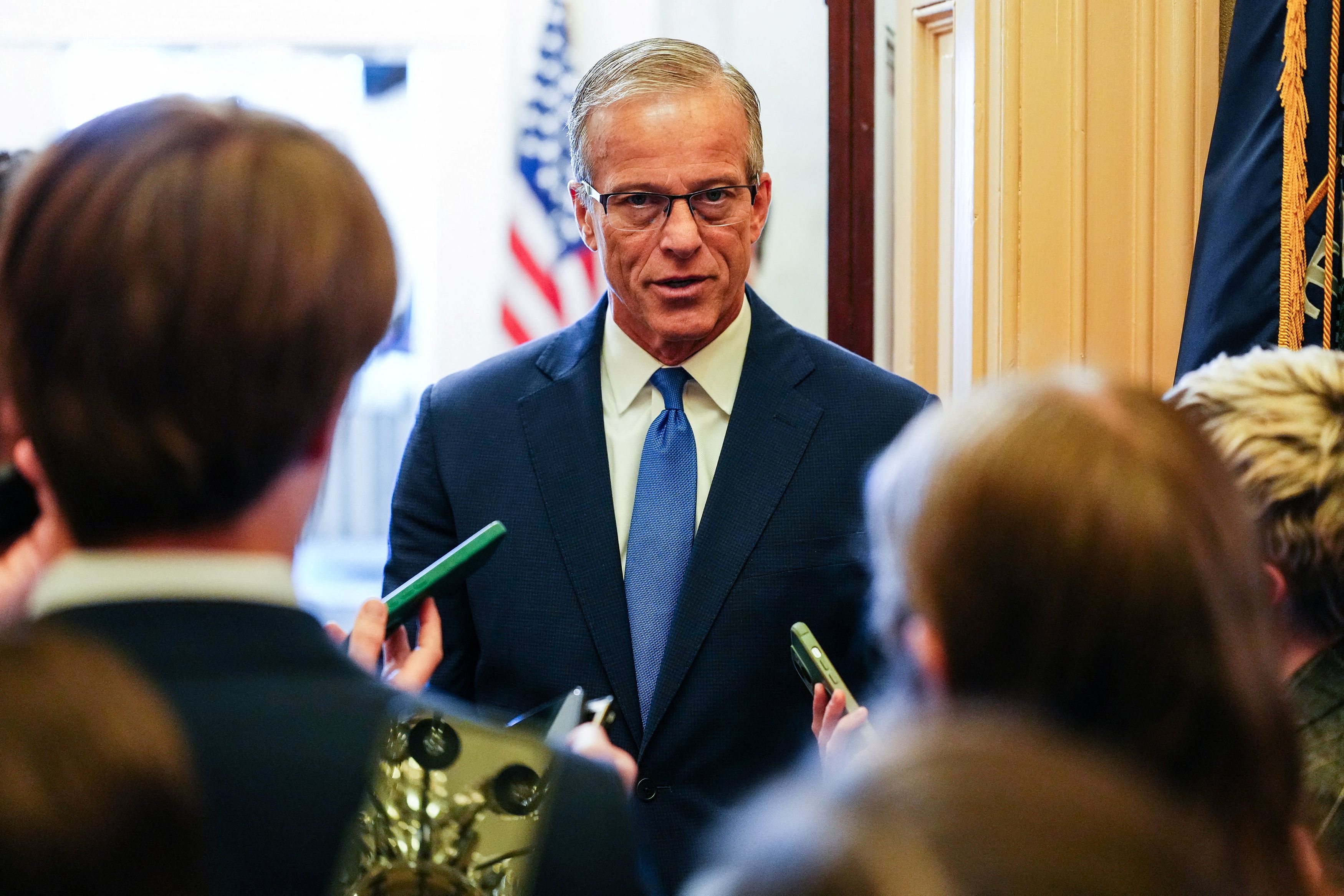 Senate Majority Leader John Thune (R-South Dakota) talks with reporters on Capitol Hill on April 28. (Eric Lee/Reuters)
