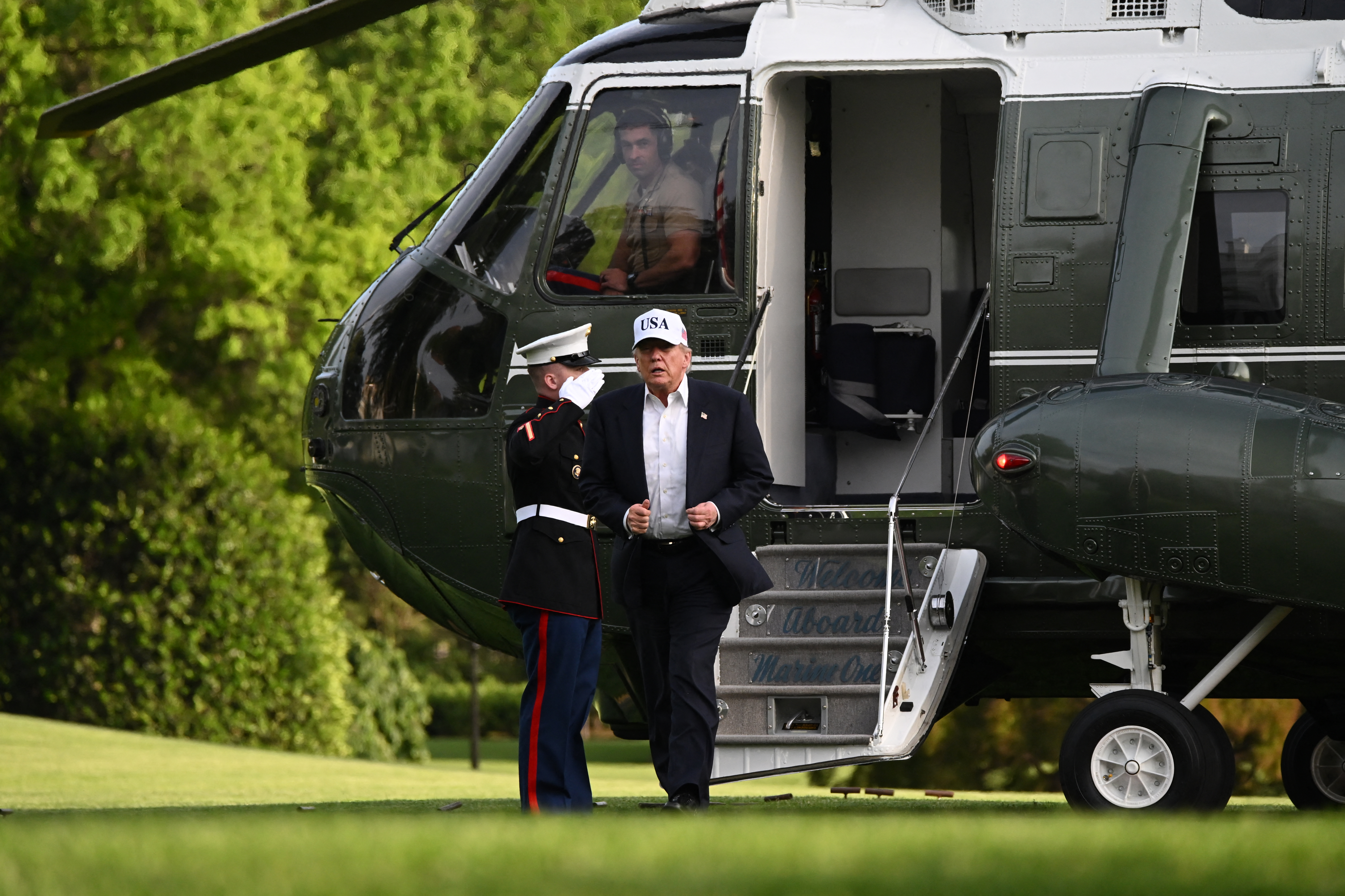 President Donald Trump walks from Marine One upon arrival on the South Lawn of the White House on May 15. (Alex Wroblewski/AFP/Getty Images)