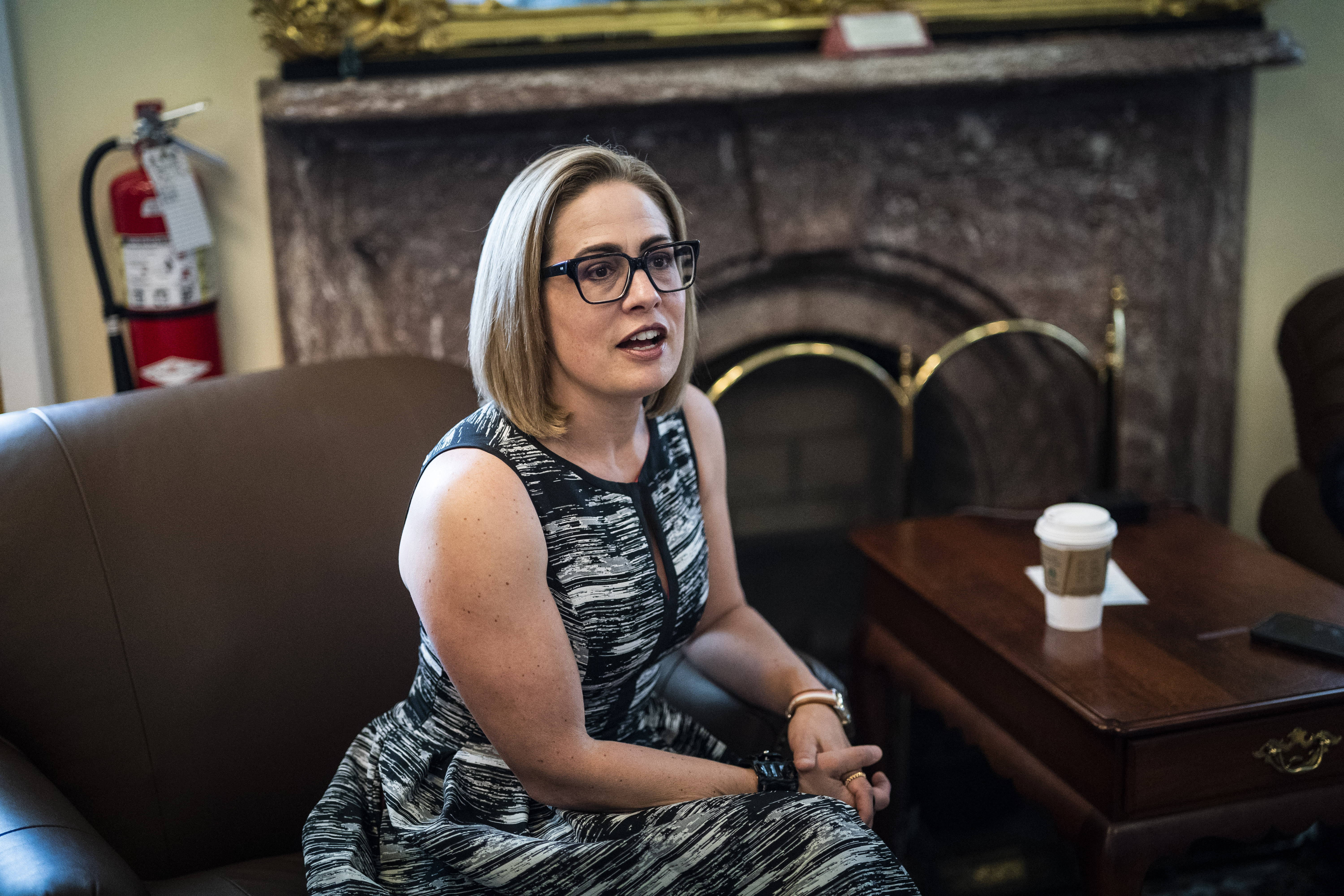 Sen. Kyrsten Sinema (I-Arizona) speaks to reporters on Capitol Hill in Washington on May 11, 2023. (Jabin Botsford/The Washington Post)