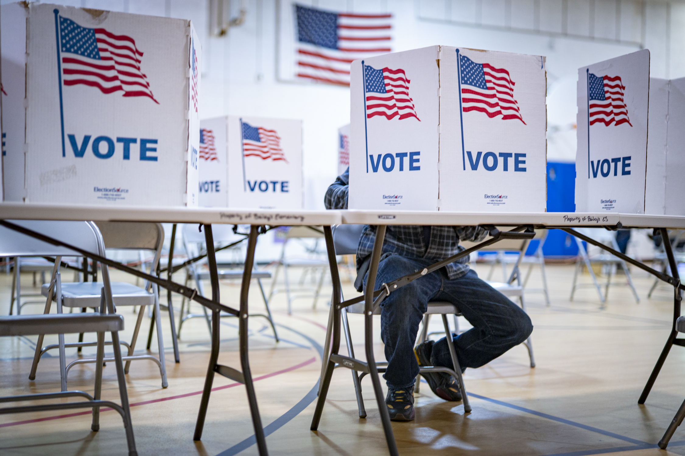 A person votes Tuesday at Bailey's Elementary School for the Arts and Sciences in Falls Church, Virginia. (Maxine Wallace/The Washington Post)