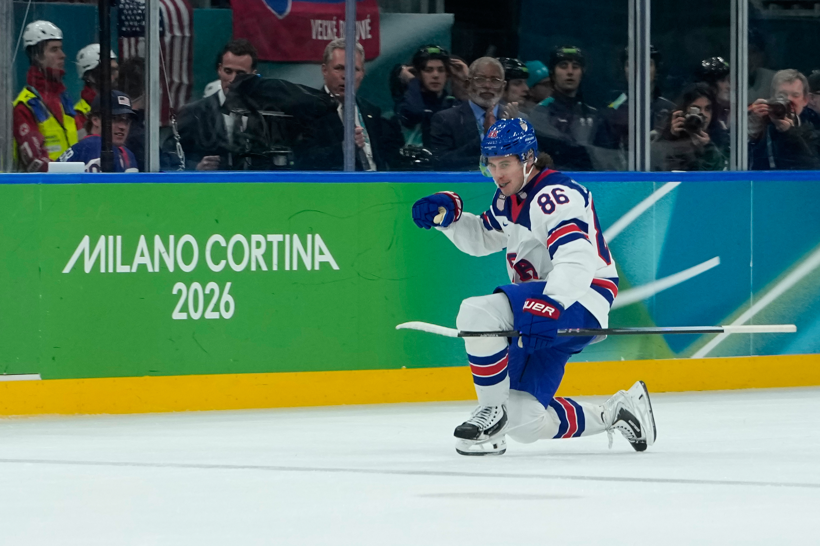 Jack Hughes scored two goals as the United States beat Slovakia to advance to the gold medal game. (Petr David Josek/AP)
