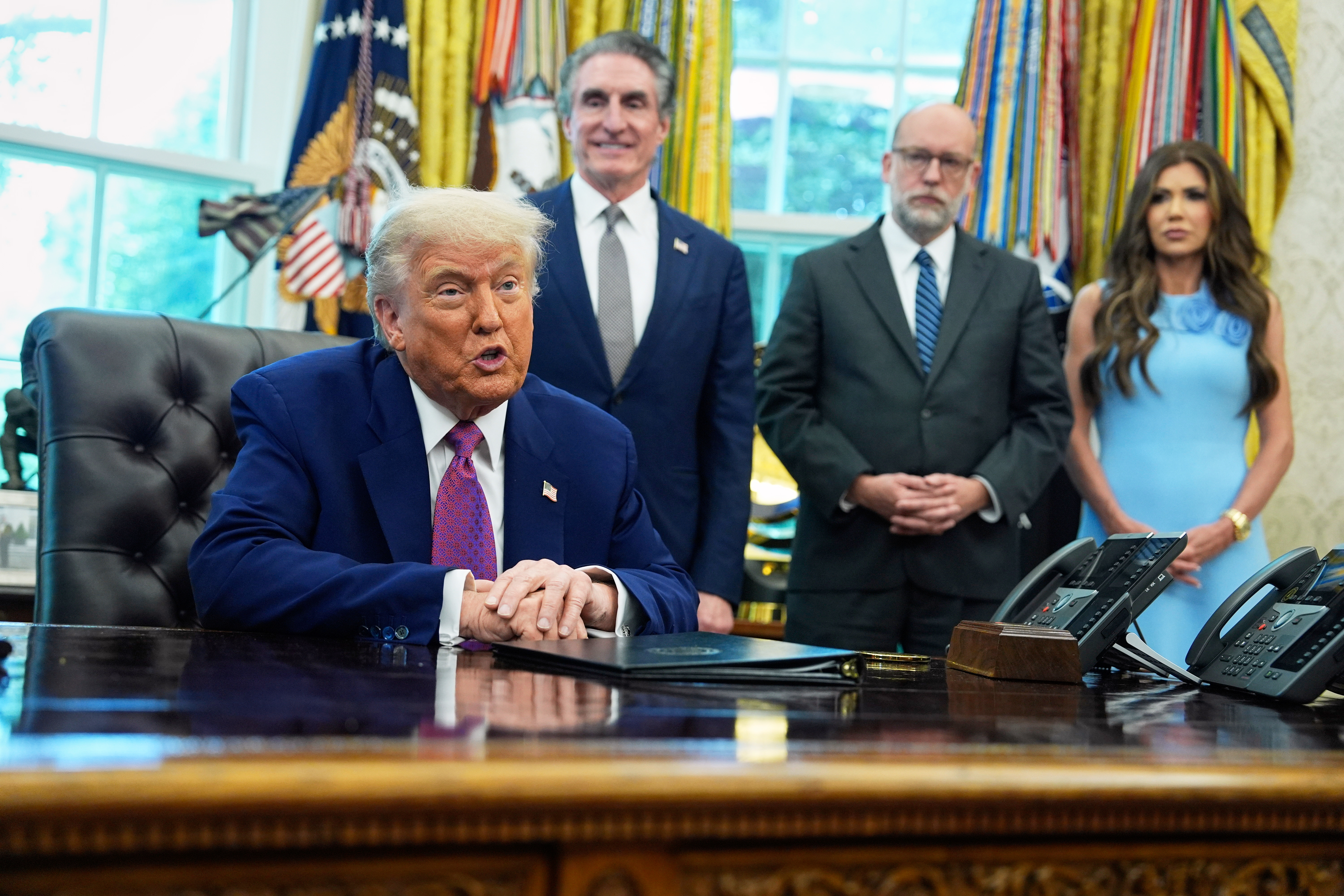 President Donald Trump speaks to reporters in the Oval Office on June 10, 2025. (Evan Vucci/AP)