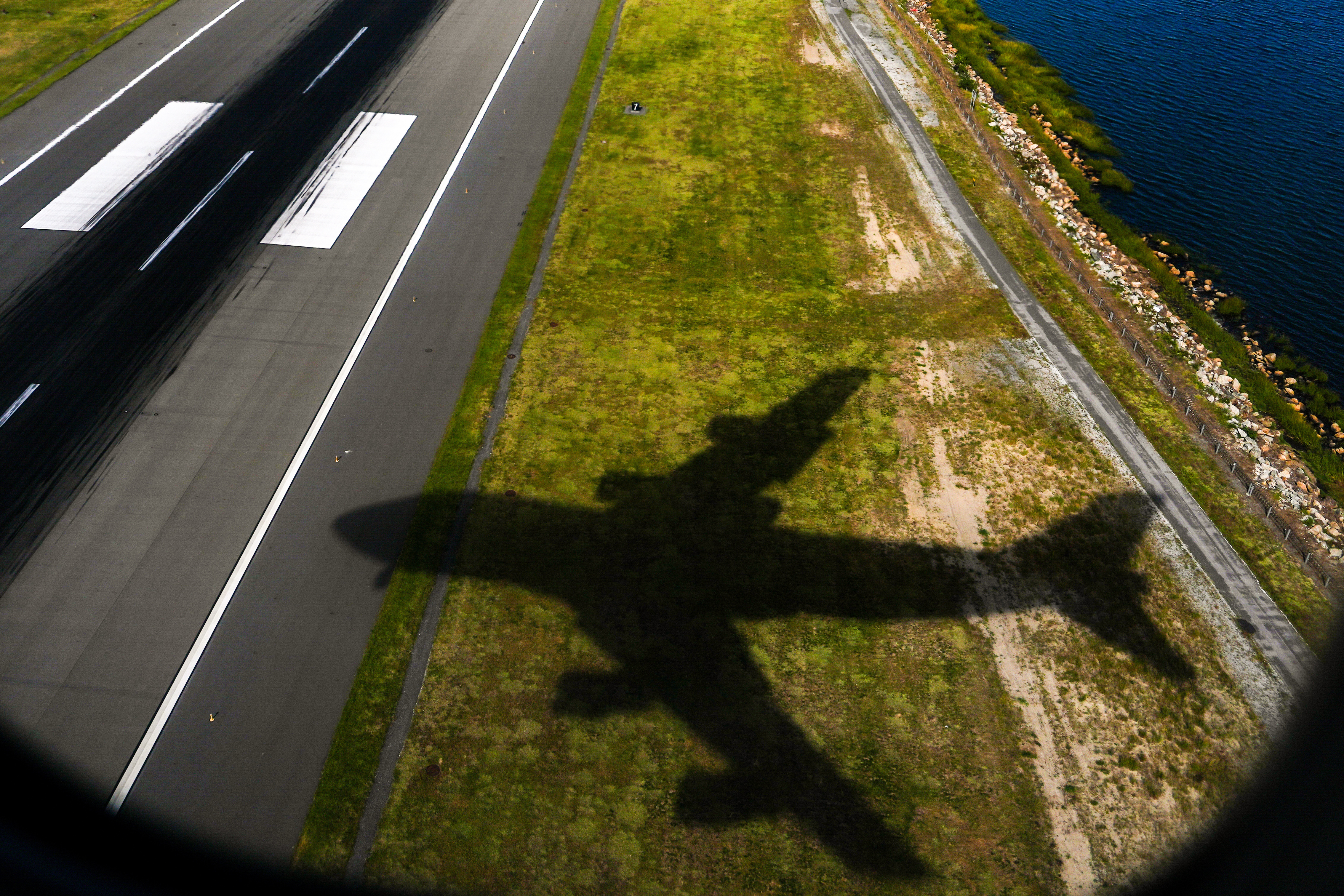 The shadow of Air Force One with President Donald Trump aboard is seen as the plane lands at John F. Kennedy International Airport this week. (Julia Demaree Nikhinson/AP)