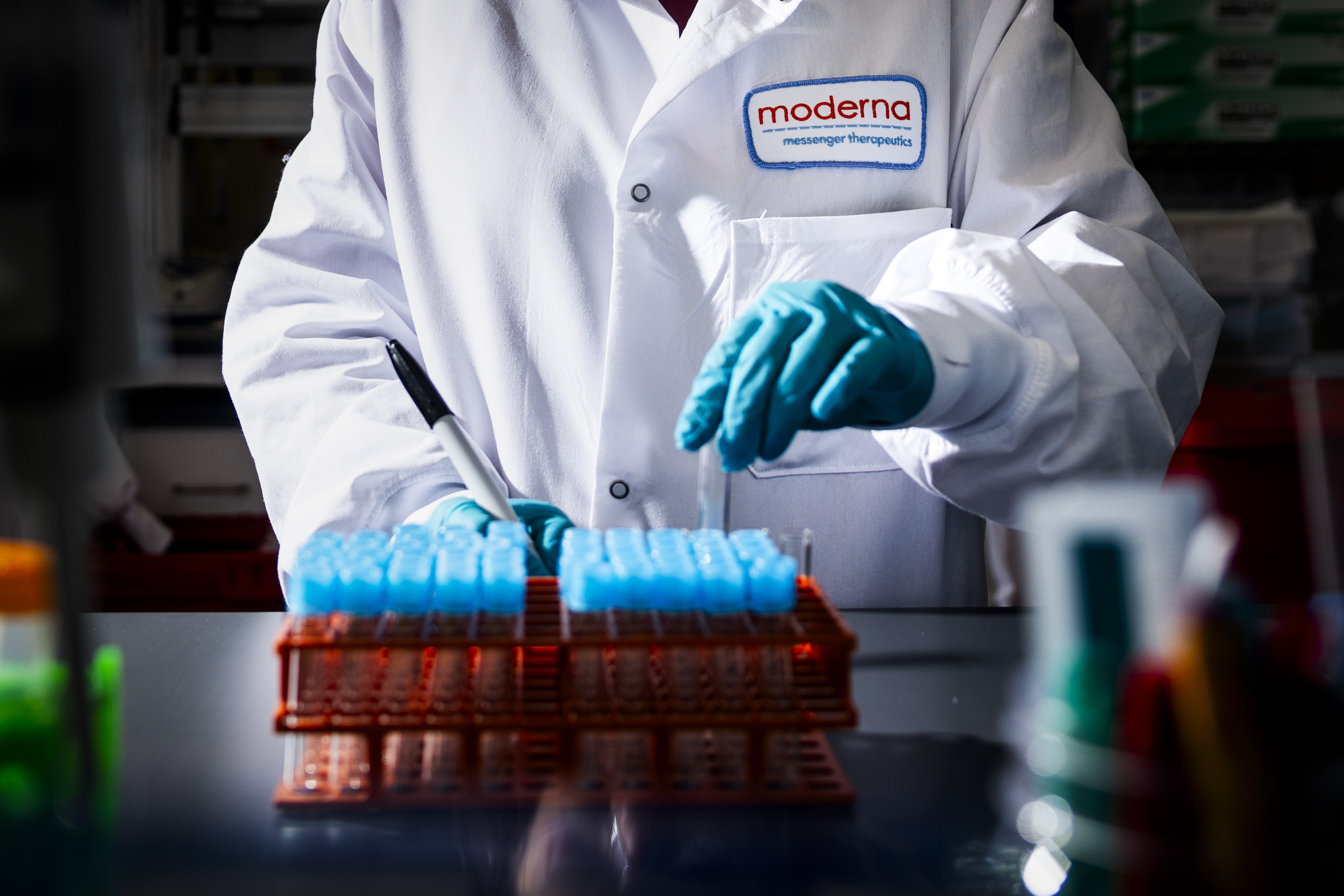 A researcher at the Moderna headquarters in Cambridge, Massachusetts, in 2024. (Adam Glanzman/Bloomberg News/Getty Images)