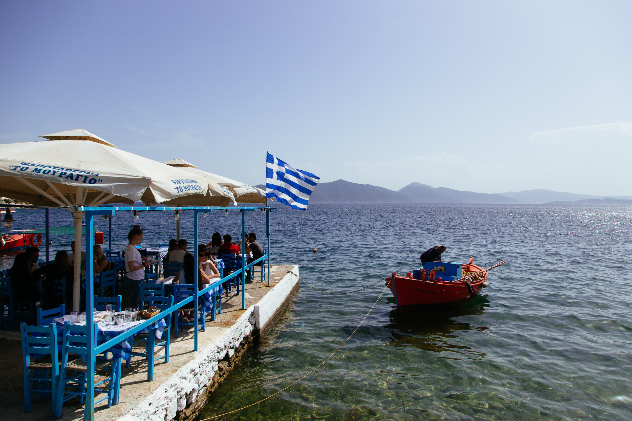 Waterside tables in Trikeri, on the Pelion Peninsula. (iStock)