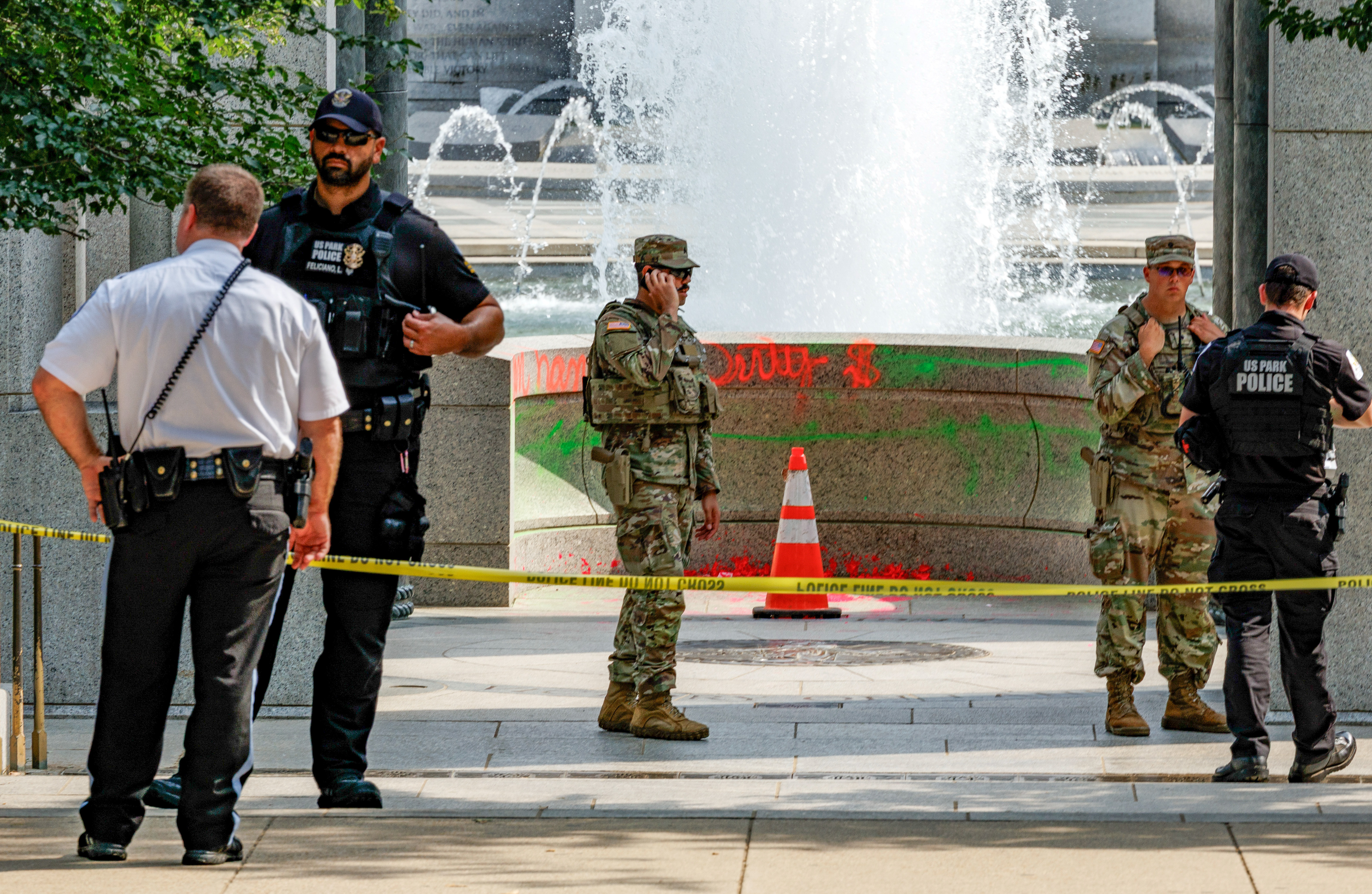 Graffiti can be seen at the World War II Memorial on Aug. 13. (Tyler M. Andrews/The Washington Post)
