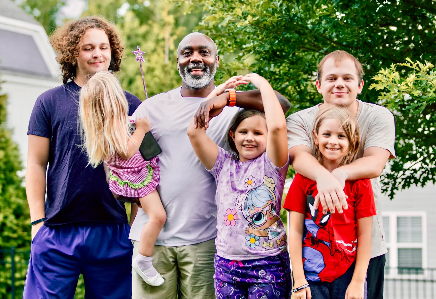 Peter Mutabazi with Anthony, left, Bella, Isabella, Luke and Zay. (Leticia Santos/@leticiaszsantos)