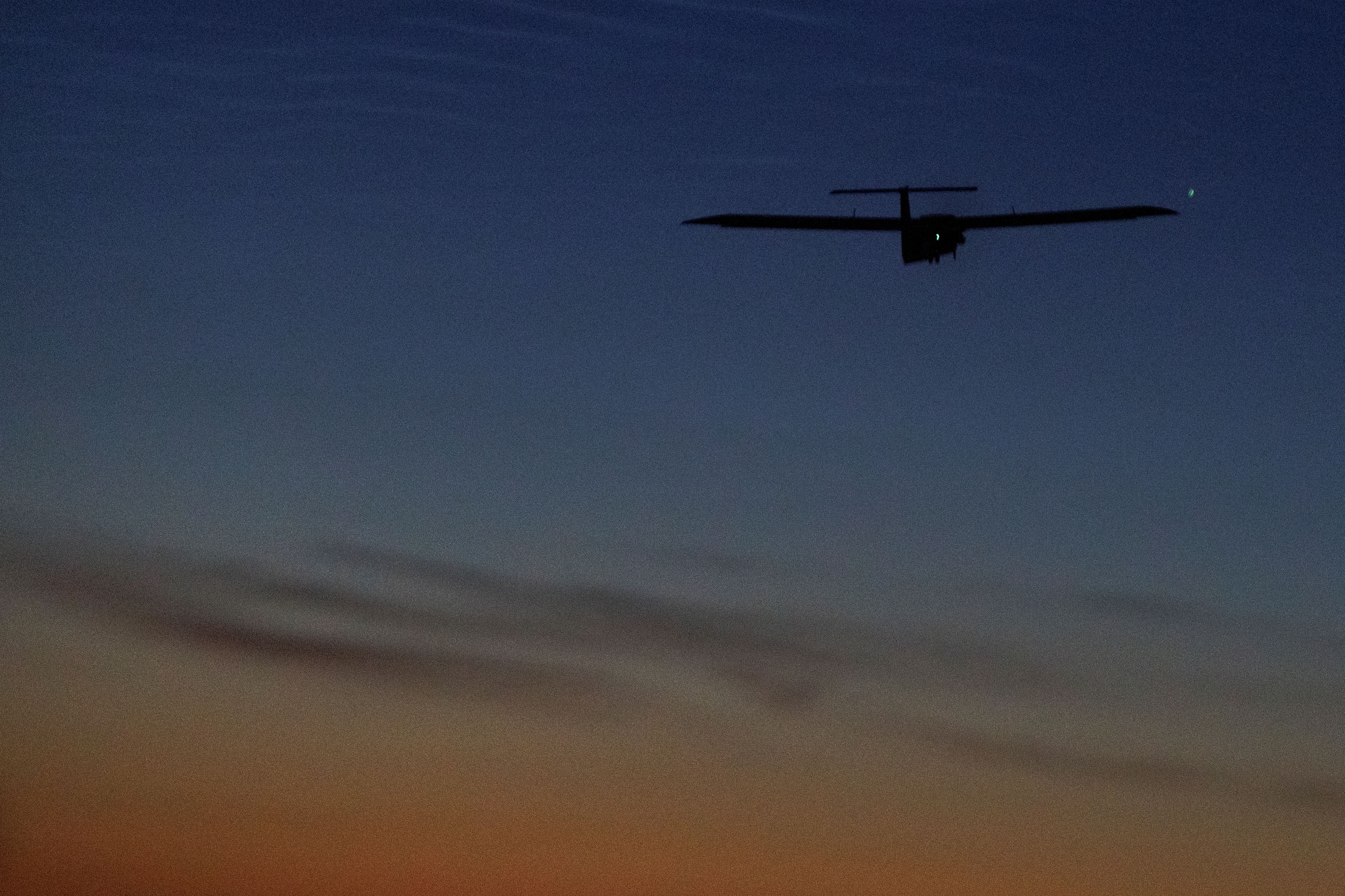 A mid-strike drone launched by Ukrainian forces flies near the front line with Russia. (Valentyn Ogirenko/Reuters)