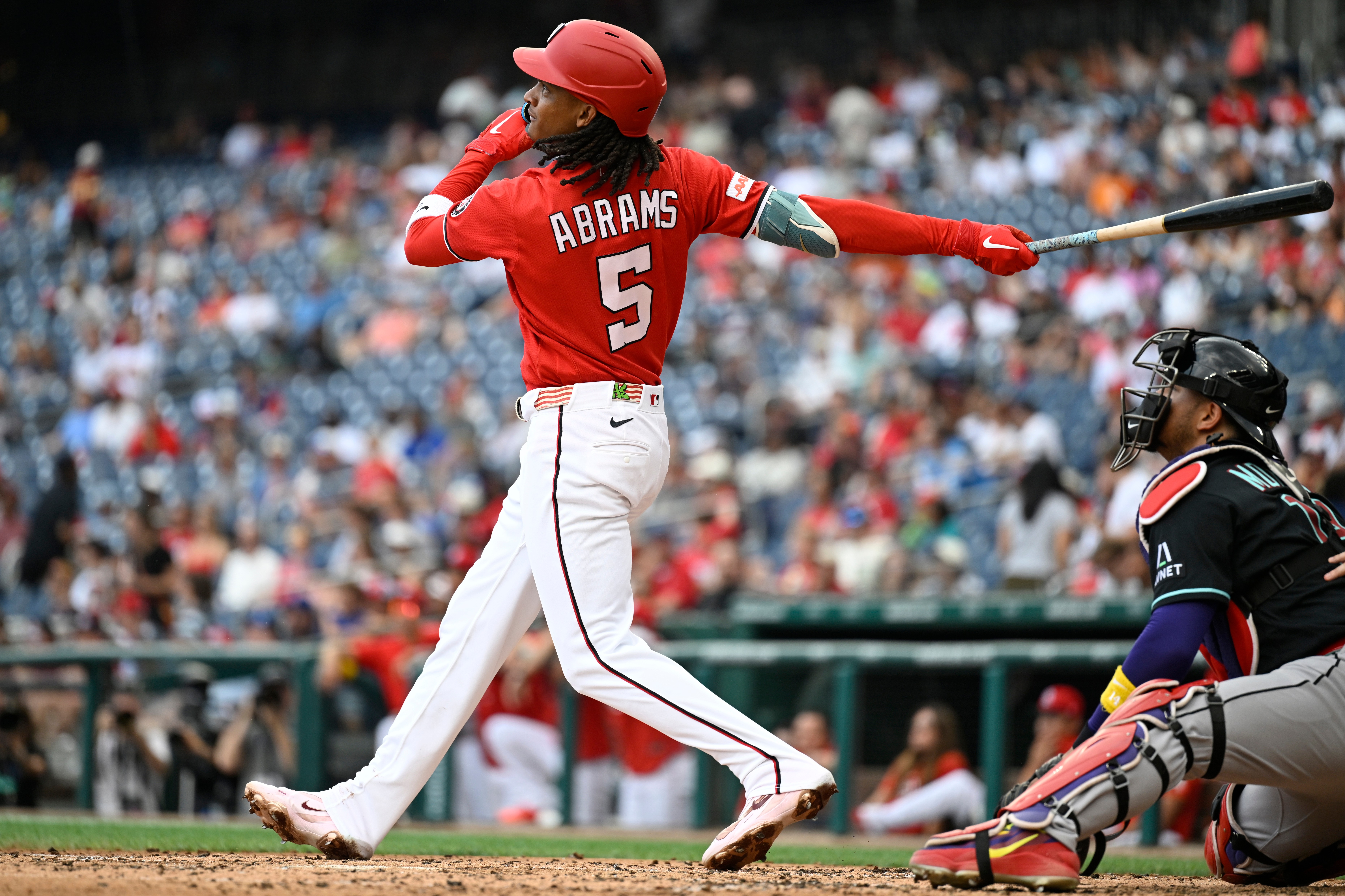 All-star CJ Abrams belts a solo home run during the third inning against the Diamondbacks. Abrams homered twice in Sunday's win. (John McDonnell/AP Photo/John McDonnell)