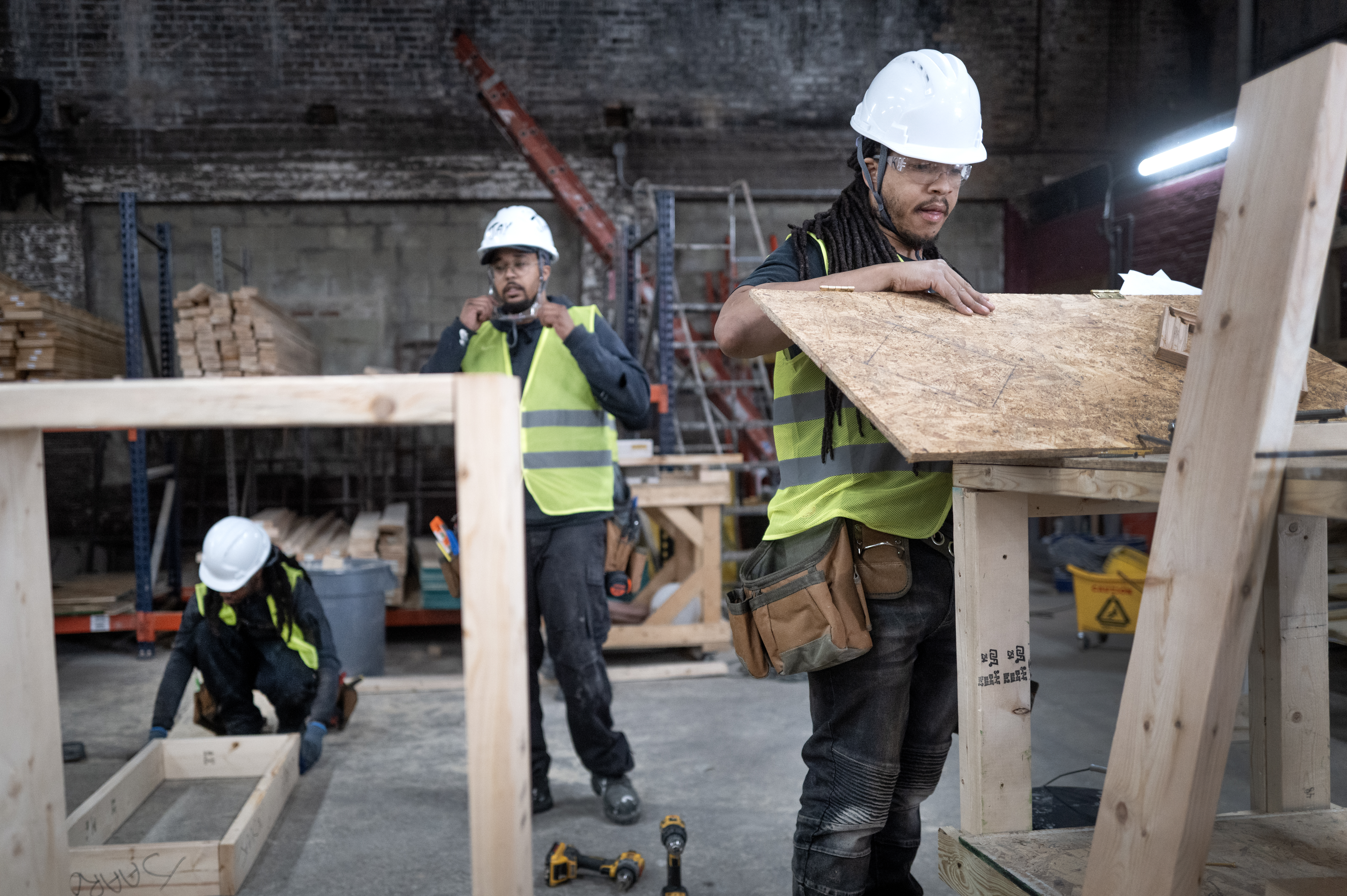 Students learn construction skills at Revolution Workshop, a nonprofit organization in Chicago that prepares them for a trade union apprenticeship program. (Scott Olson/Getty Images)