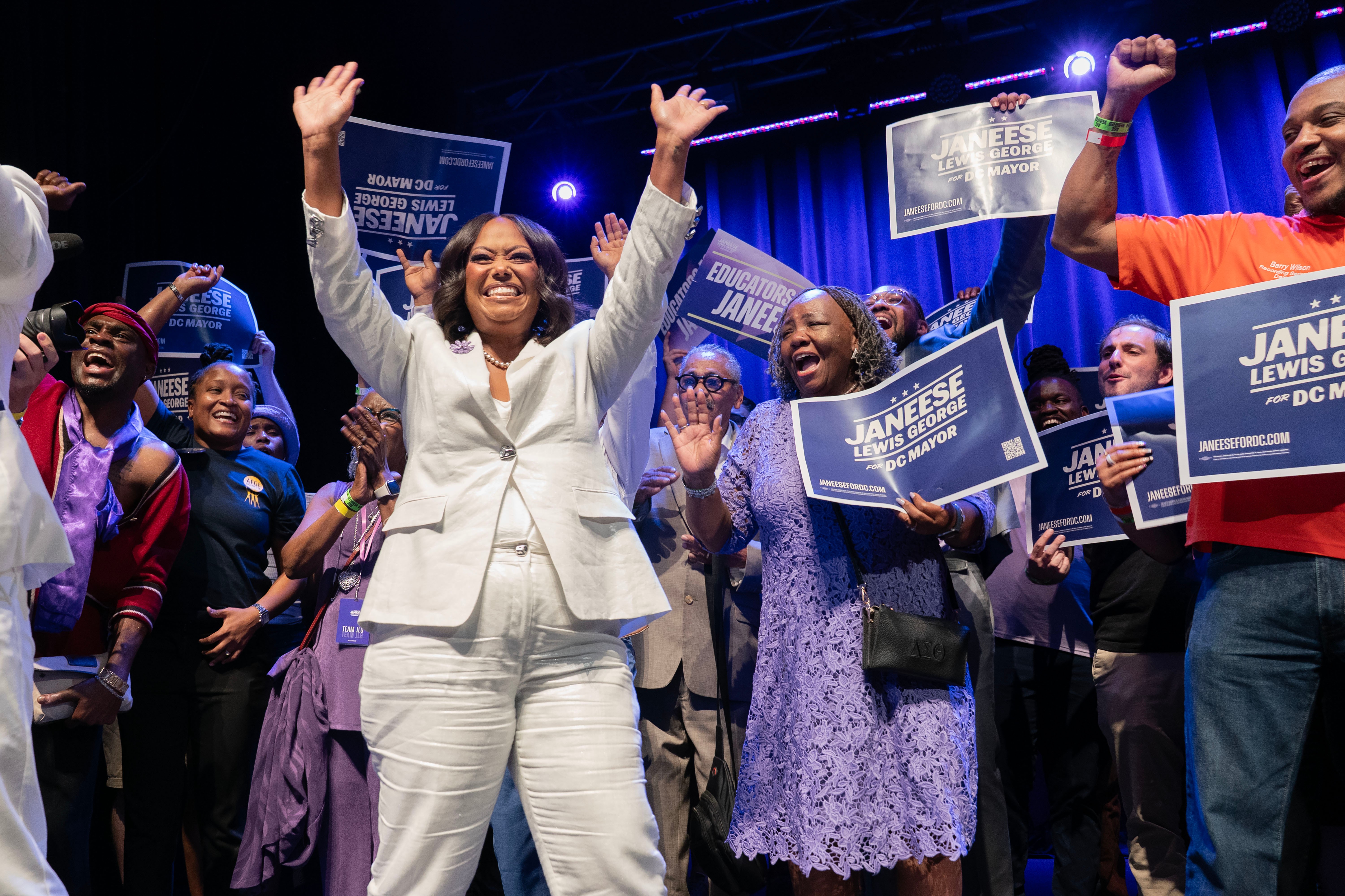 D.C. Council member Janeese Lewis George celebrates her victory in the Democratic primary election for mayor on election night, June 16, at the Howard Theatre. (Jose Luis Magana/AP)