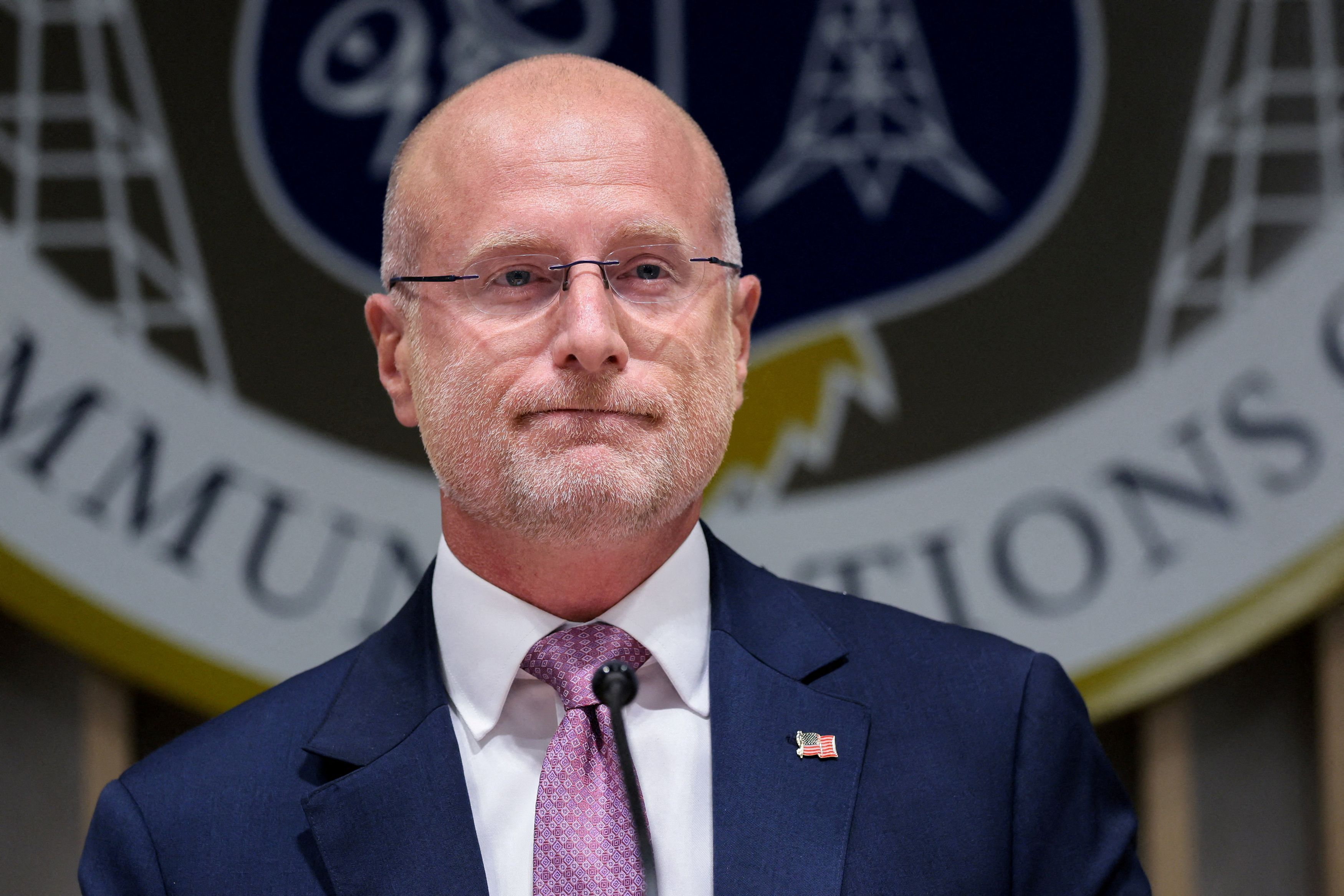 Federal Communications Commission Chairman Brendan Carr listens to a question during a news conference July 22 in Washington. (Kylie Cooper/Reuters)