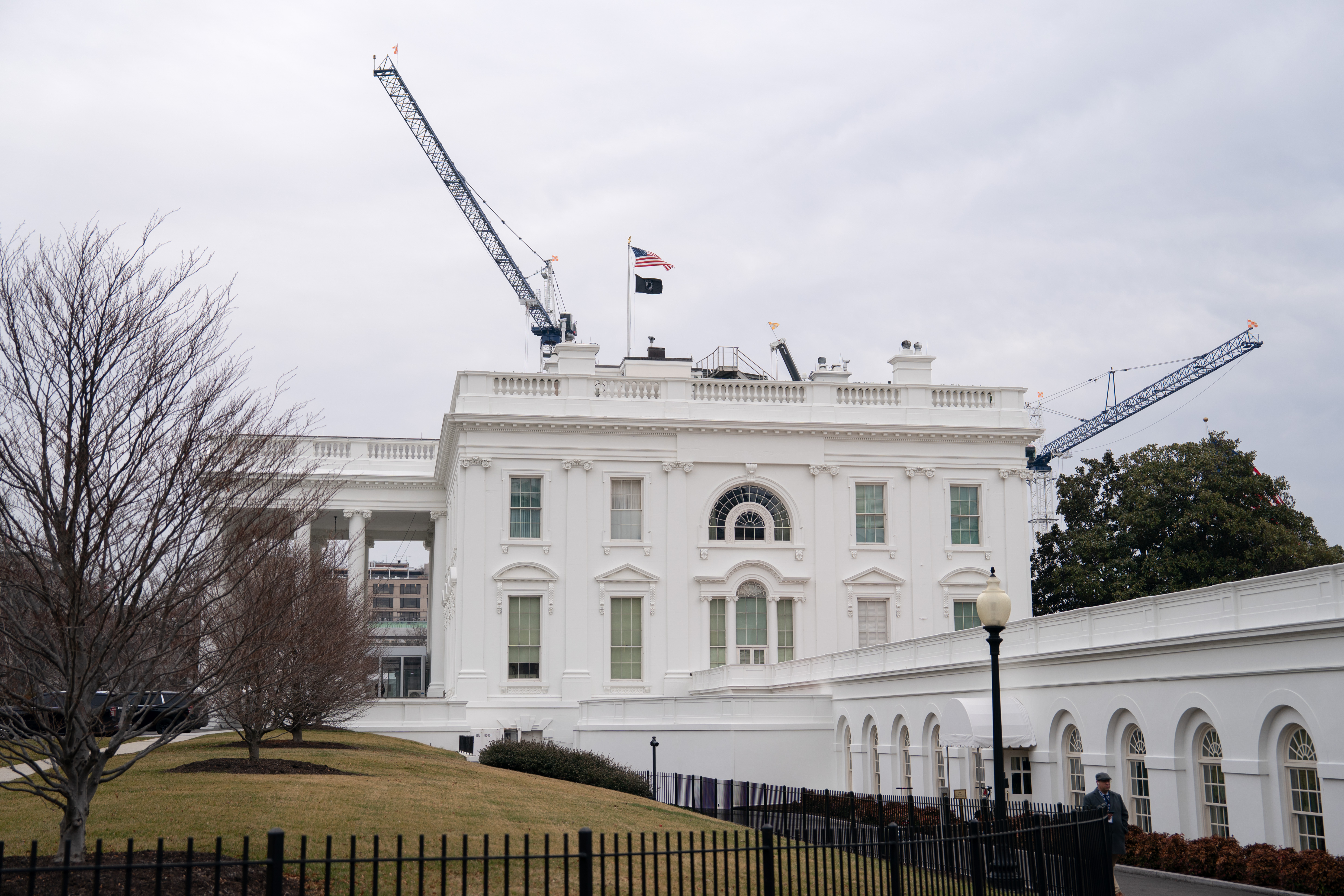 Cranes are seen last month over the area where the East Wing once stood and where President Donald Trump has been seeking to construct a ballroom. (Peter W. Stevenson/The Washington Post)