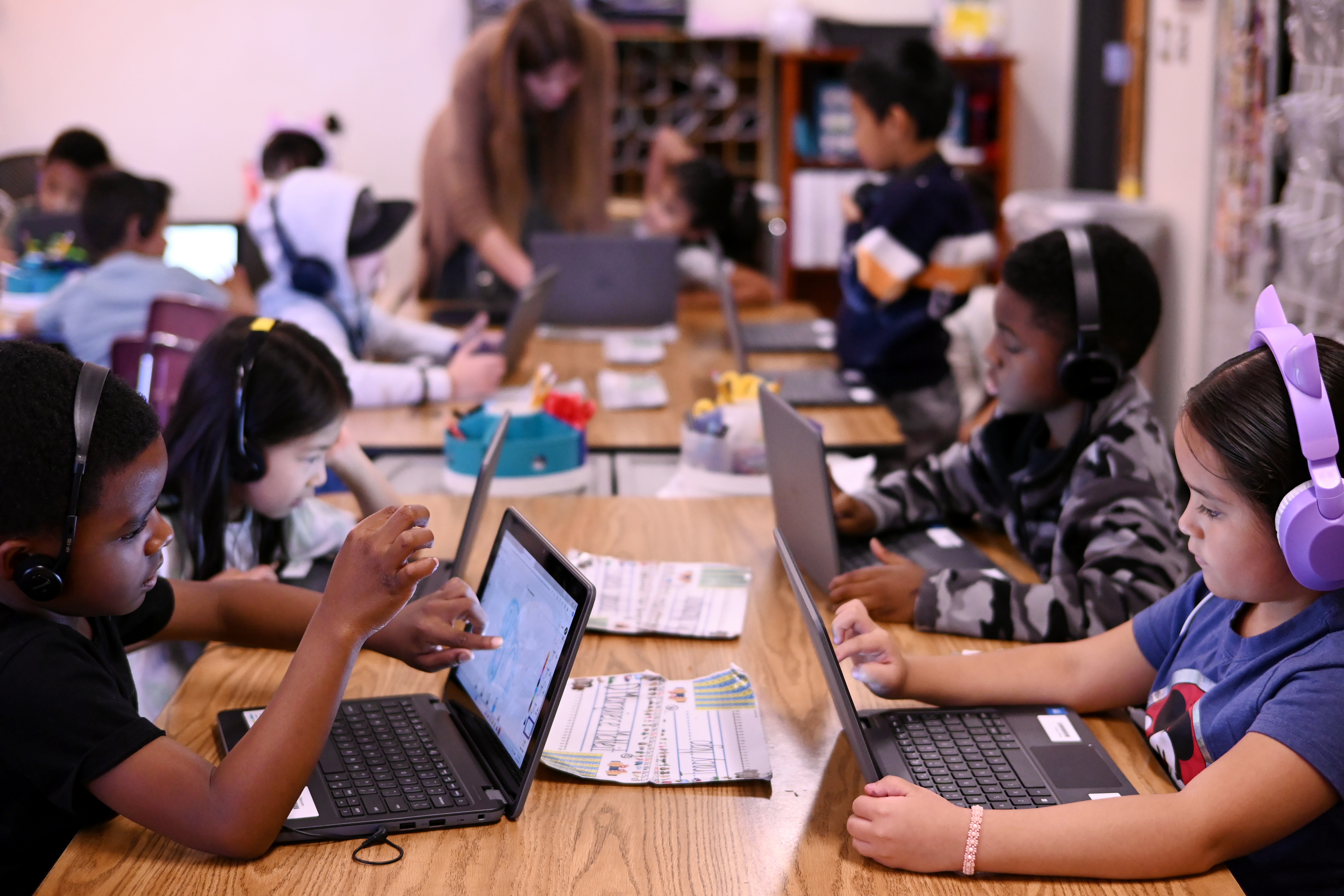 First-graders work on their laptops in a classroom in Colorado in 2024. (Hyoung Chang/Denver Post via Getty Images)