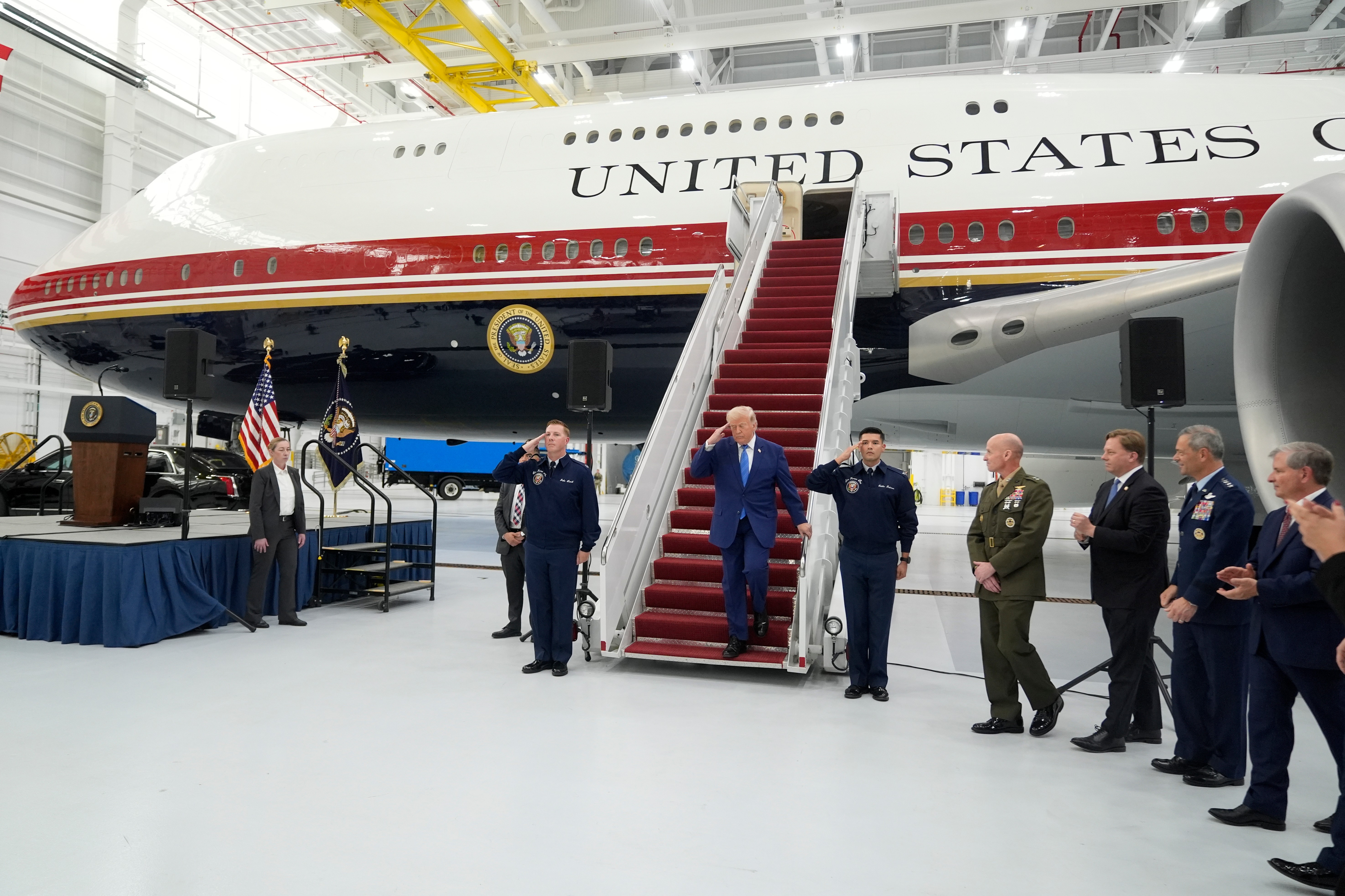President Donald Trump on Friday exits the plane that will soon serve as Air Force One. (Manuel Balce Ceneta/AP)