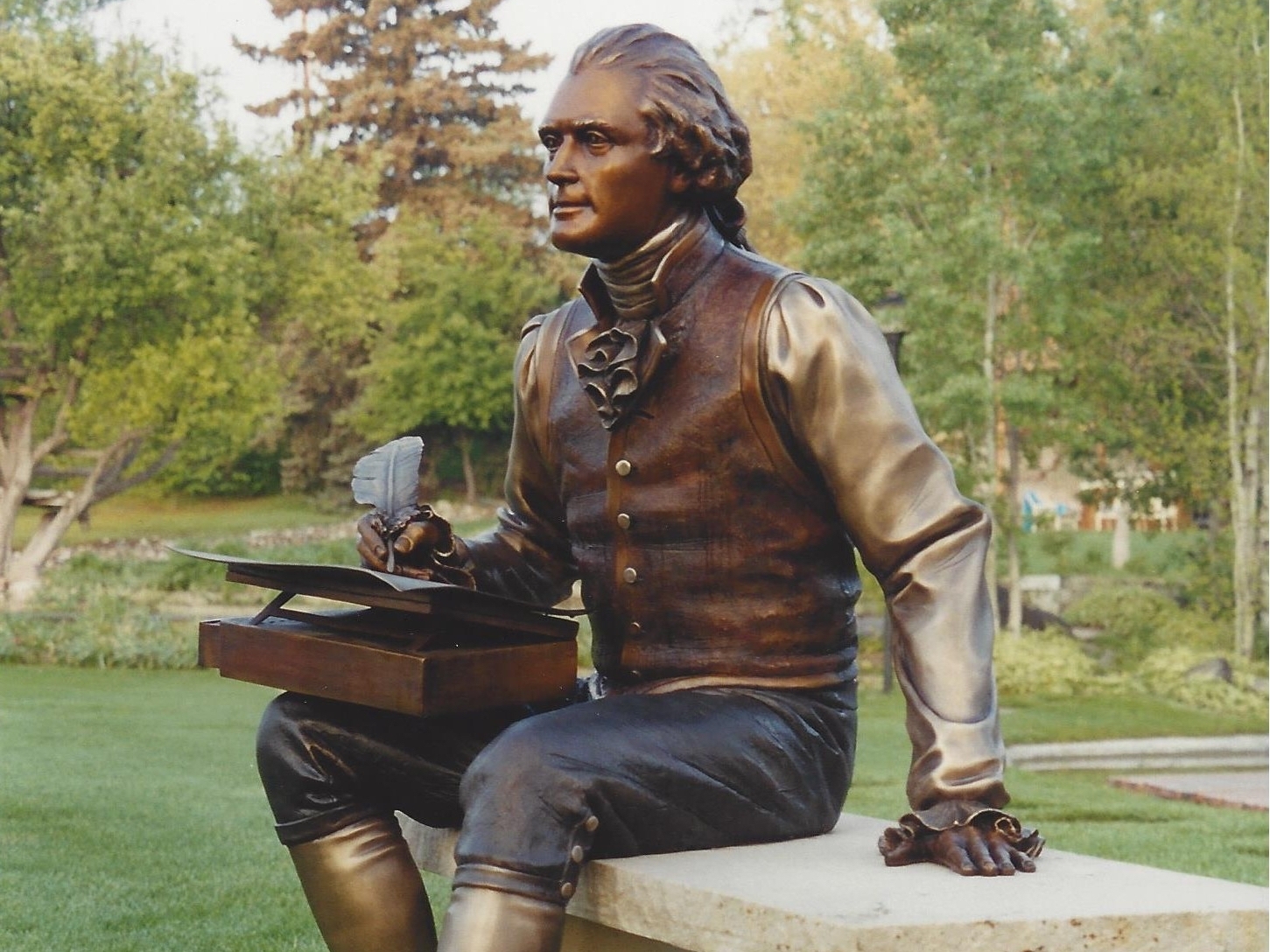 This statue depicts Thomas Jefferson seated with a draft of the Declaration of Independence. It was added to the Rose Garden last week. (Fabrice Dolegowski)