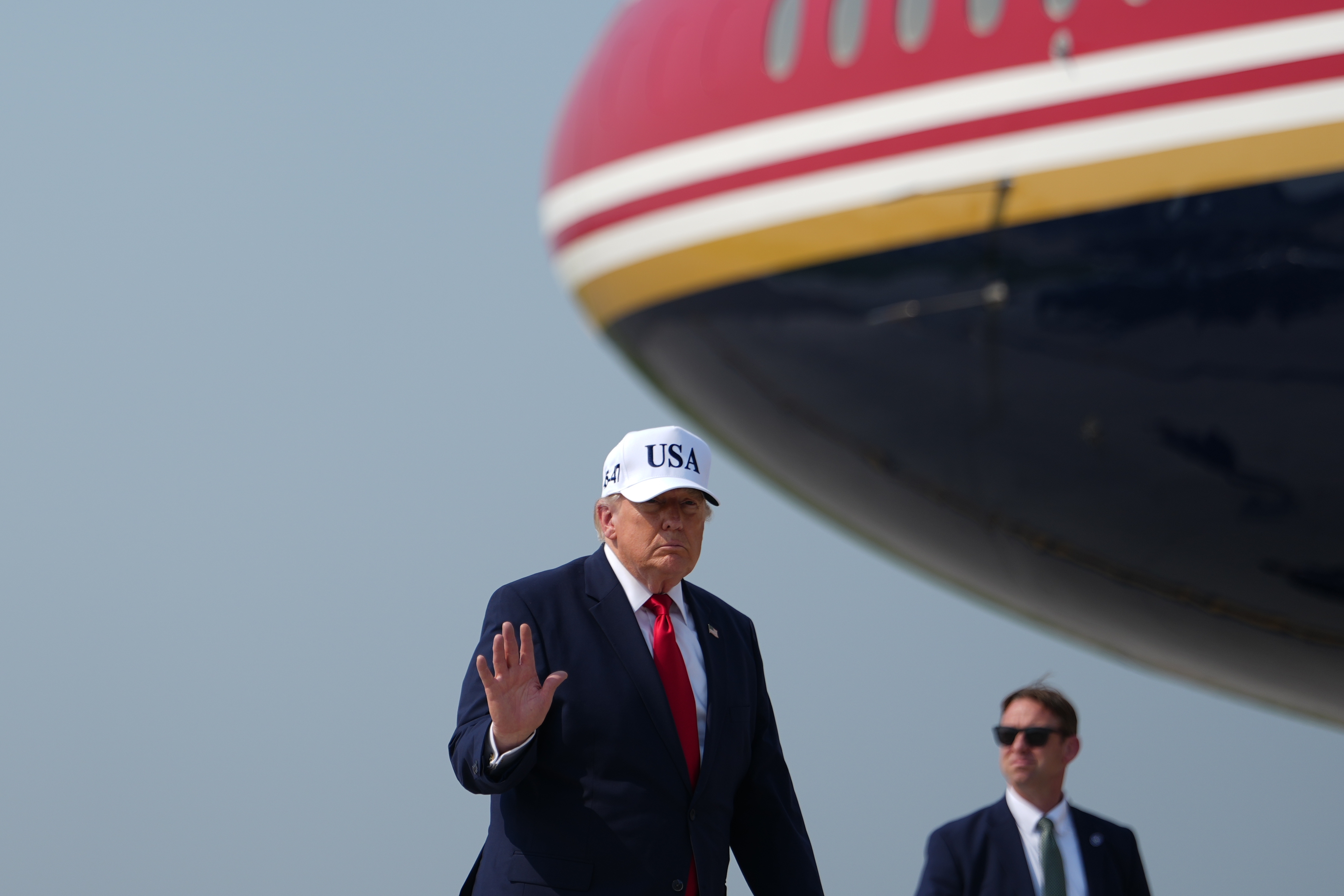 President Donald Trump prepares to board Air Force One on July 1 in Bismarck, N.D. (AP Photo/Julia Demaree Nikhinson)