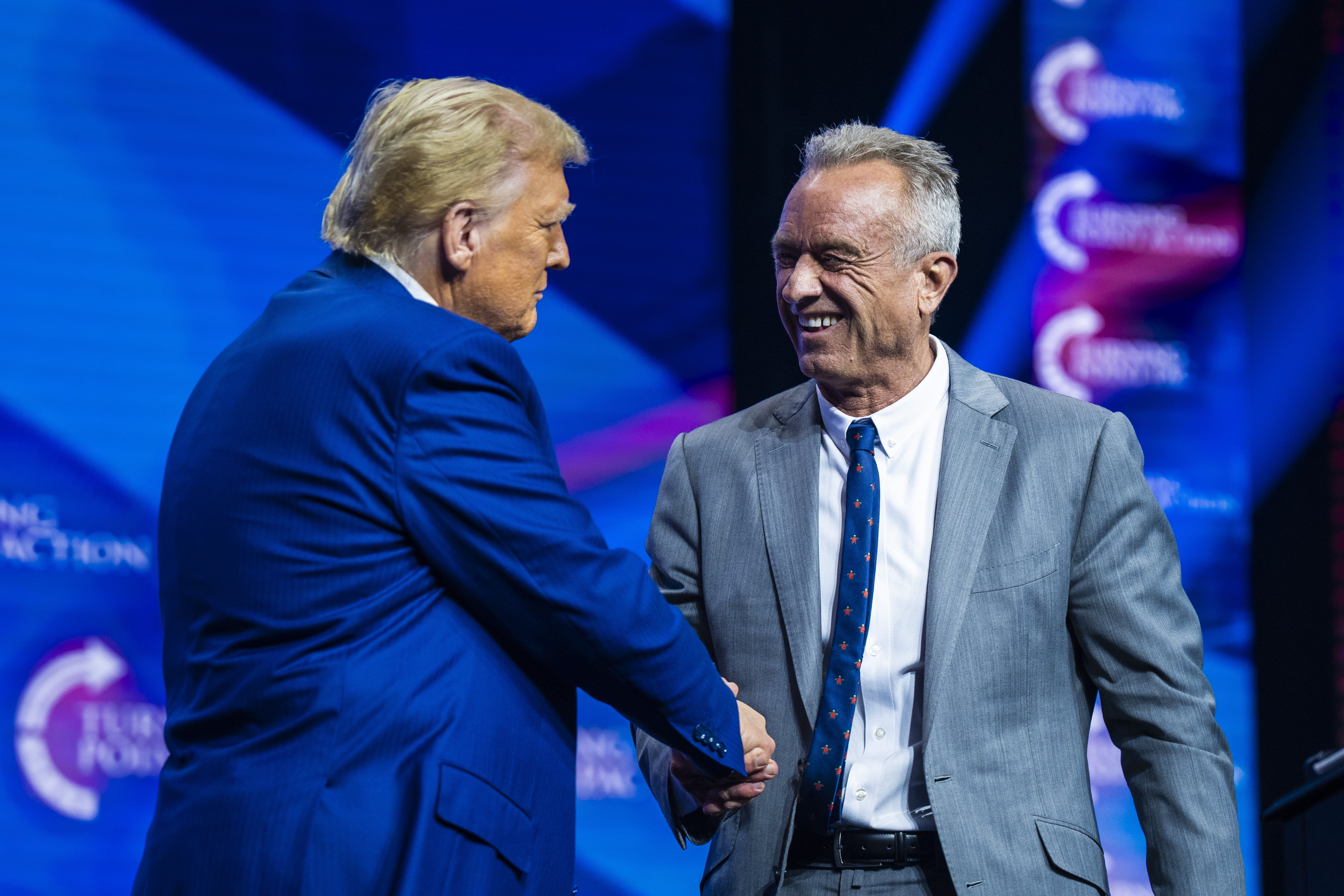 Robert F. Kennedy Jr. with Republican presidential nominee Donald Trump in October 2024 at a Turning Point Action rally in Duluth, Georgia. (Jabin Botsford/The Washington Post)