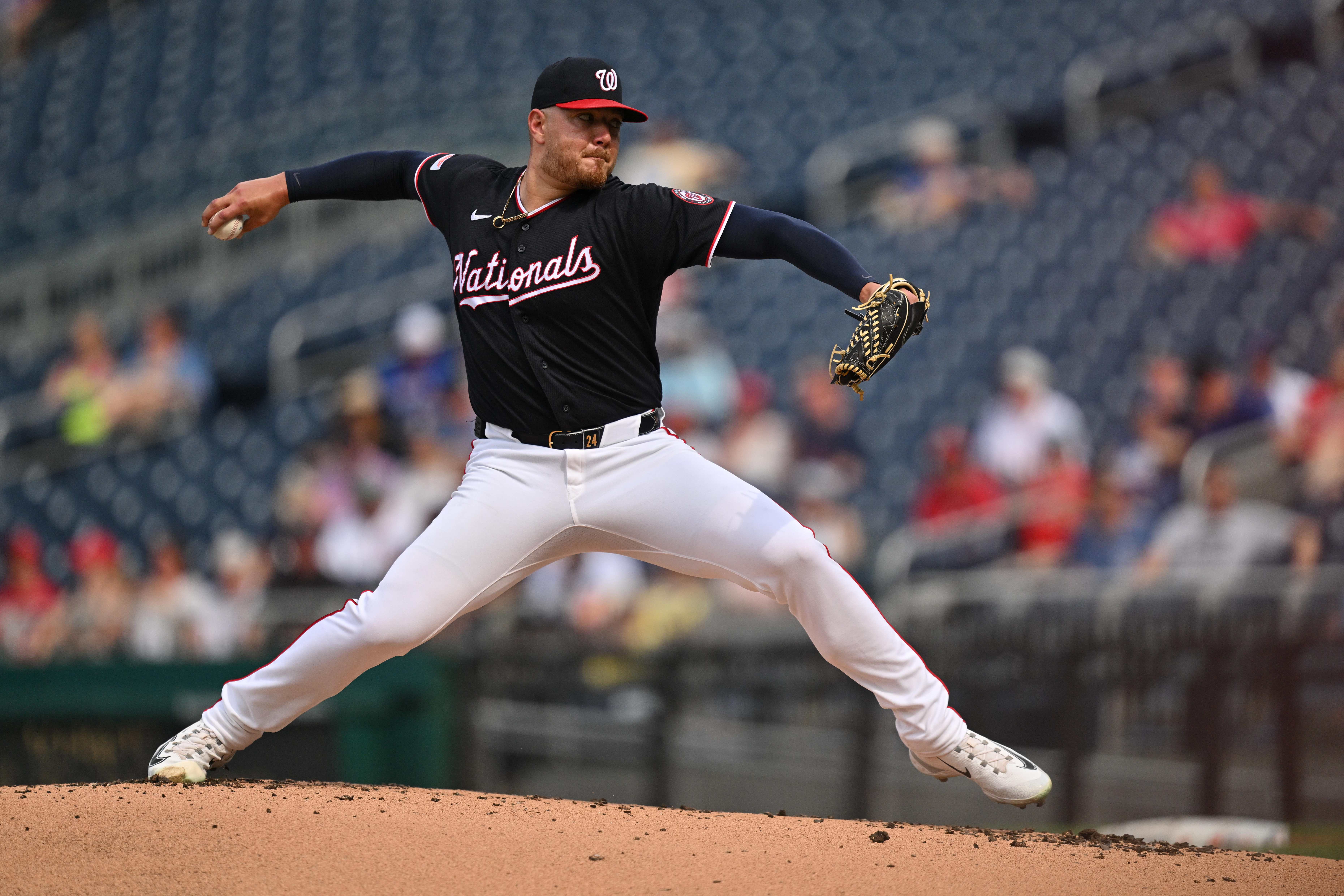 Cade Cavalli pitches in the second inning against the Chicago Cubs on Thursday. (Jamie Sabau/Getty Images)