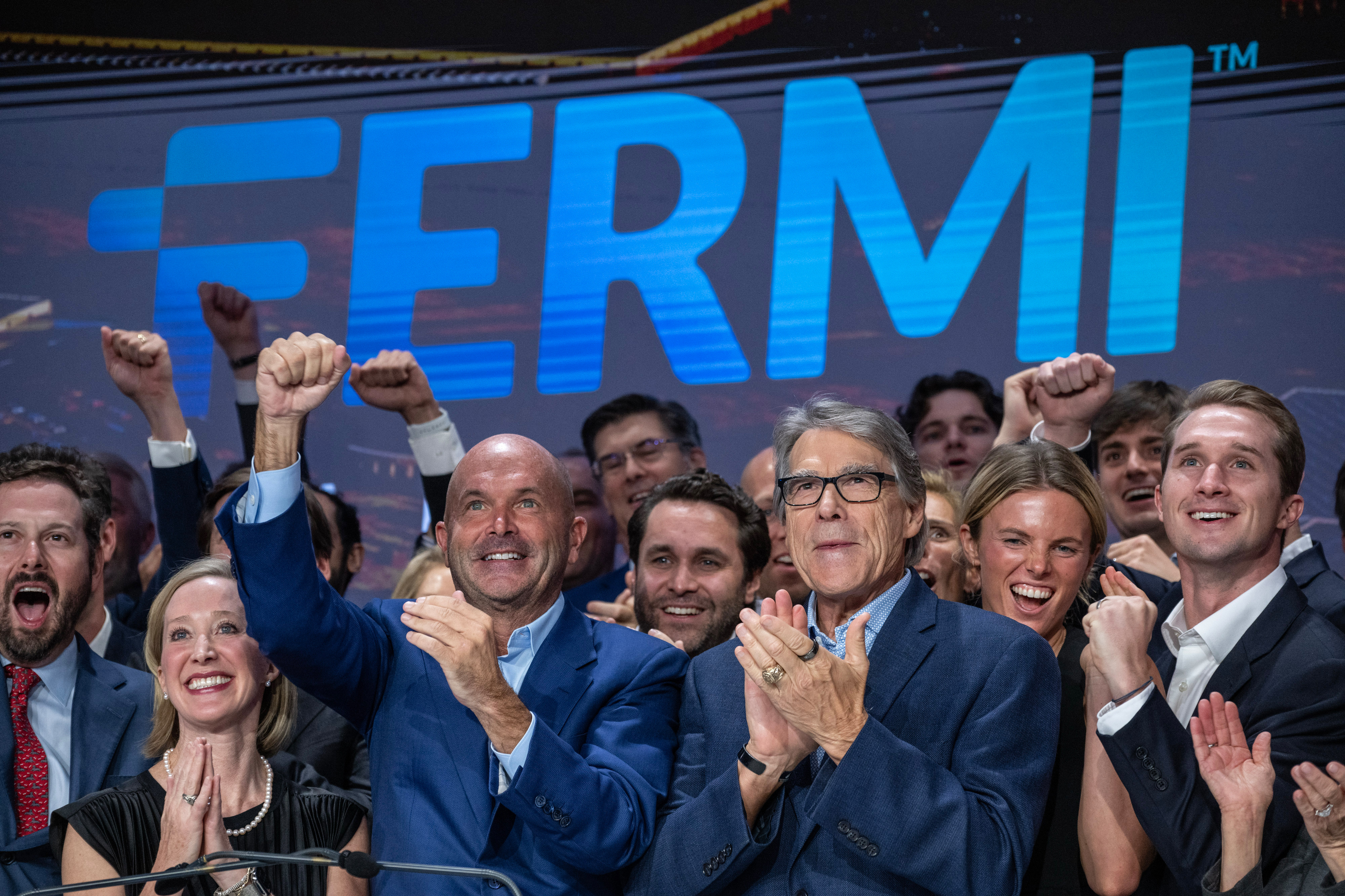 Toby Neugebauer, then-CEO of Fermi America, center left, and Rick Perry, former U.S. energy secretary, center right, at the company's initial public offering in New York in October 2025. (Bloomberg/Getty Images)