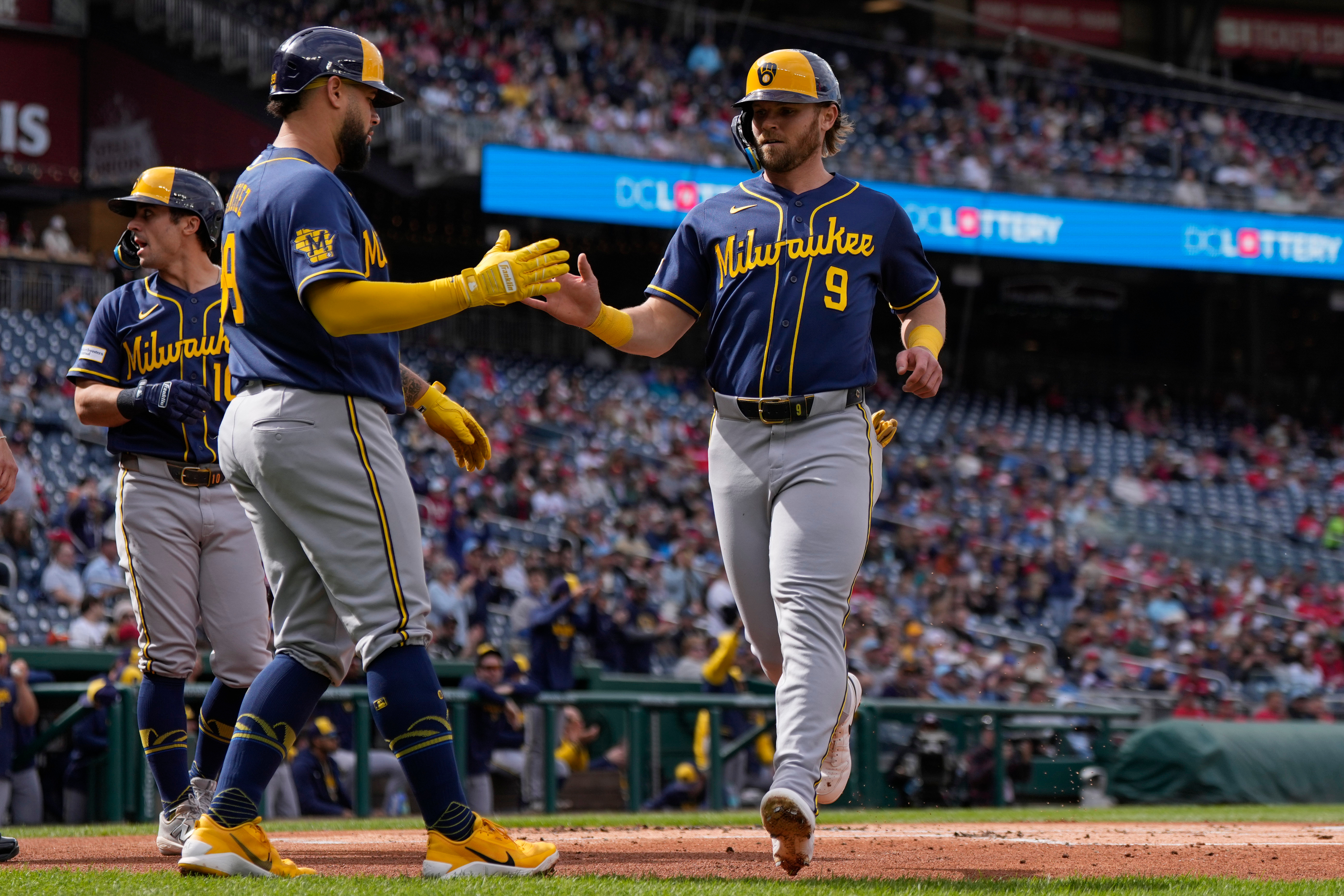 Gary Sánchez, left, and Jake Bauers scored for the Brewers in the first inning, which was extended by a Brady House error. (Jess Rapfogel/AP)