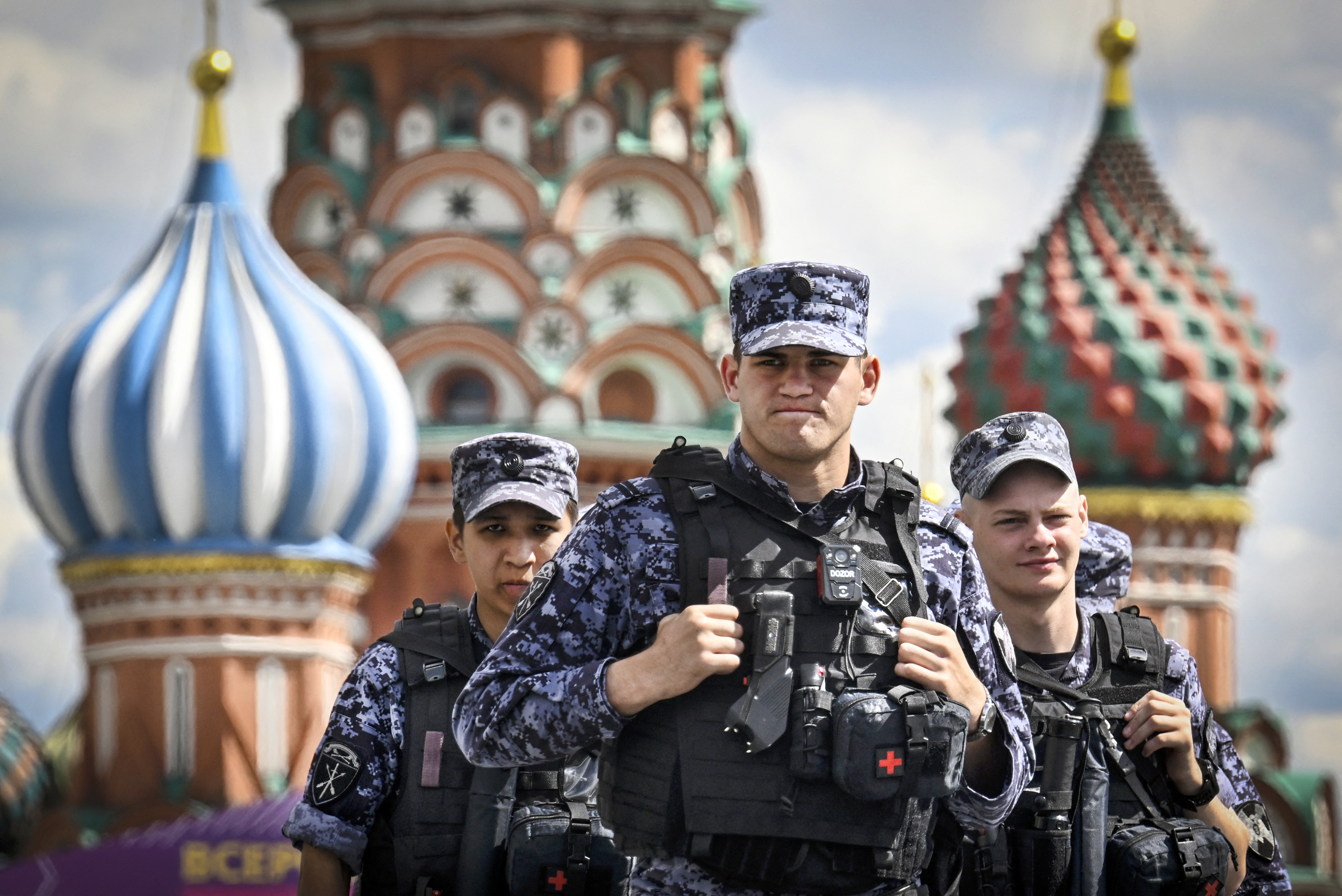 Russian servicemen patrol Red Square in front of St. Basil’s Cathedral in Moscow on Friday. (Alexander Nemenov/AFP/Getty Images)