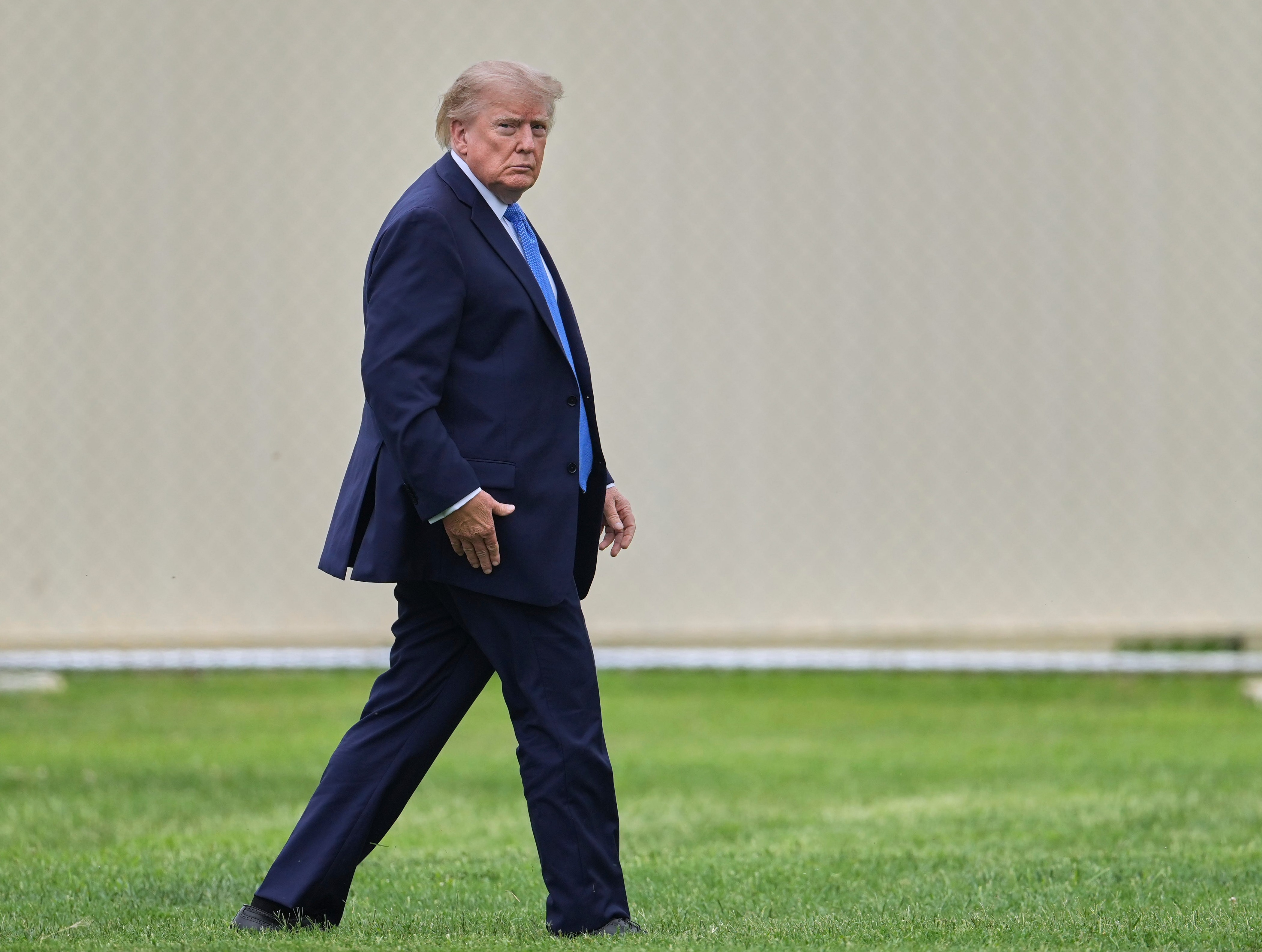 President Donald Trump appears heavier in recent photos, such as this one taken Aug. 14, than he did during his most recent campaign. (Mark Schiefelbein/AP)