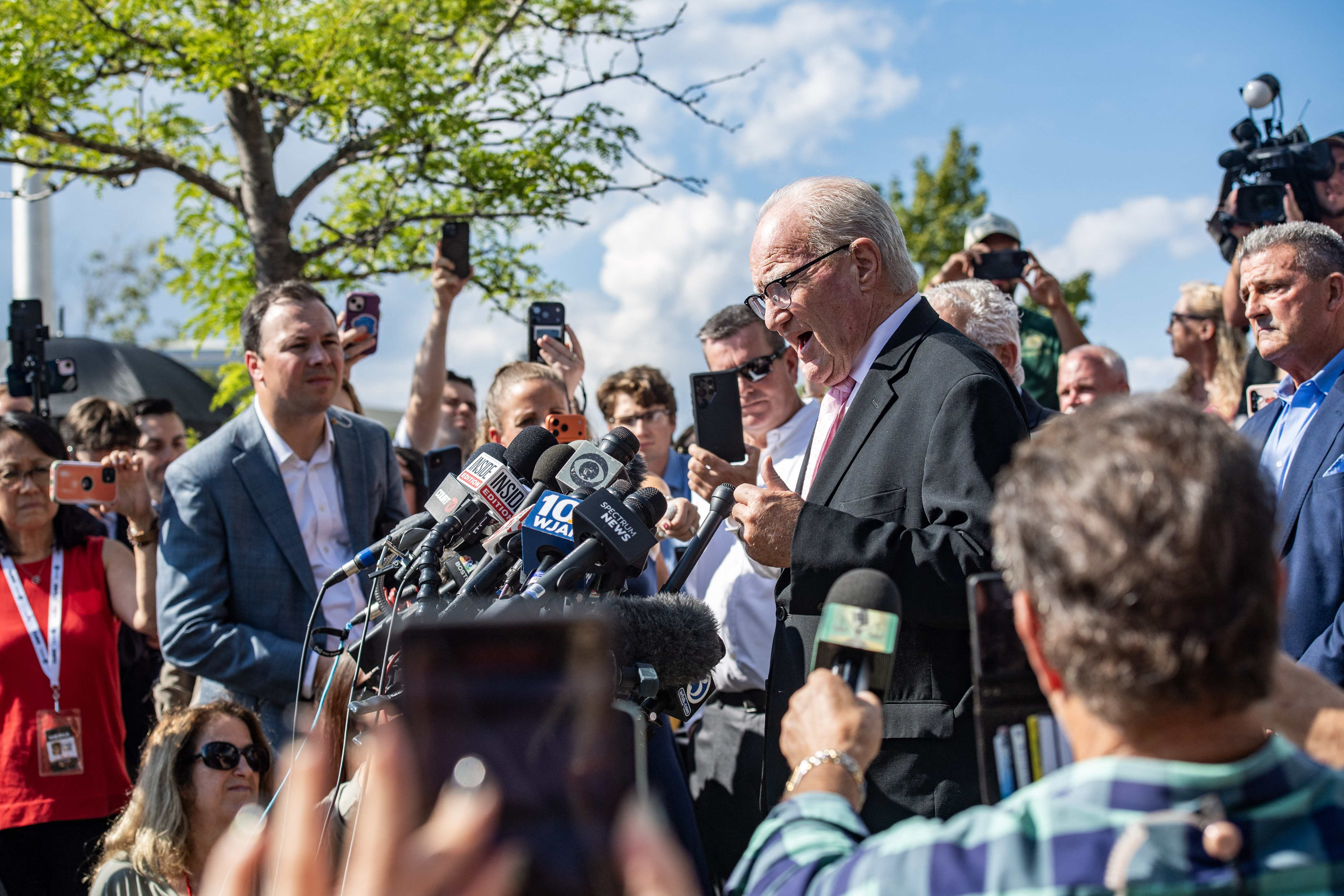 Kevin Reddington, center, Lindsay Clancy’s defense attorney, speaks to the press outside the court in Plymouth, Massachusetts, after a mistrial was declared. (Joseph Prezioso/AFP/Getty Images)