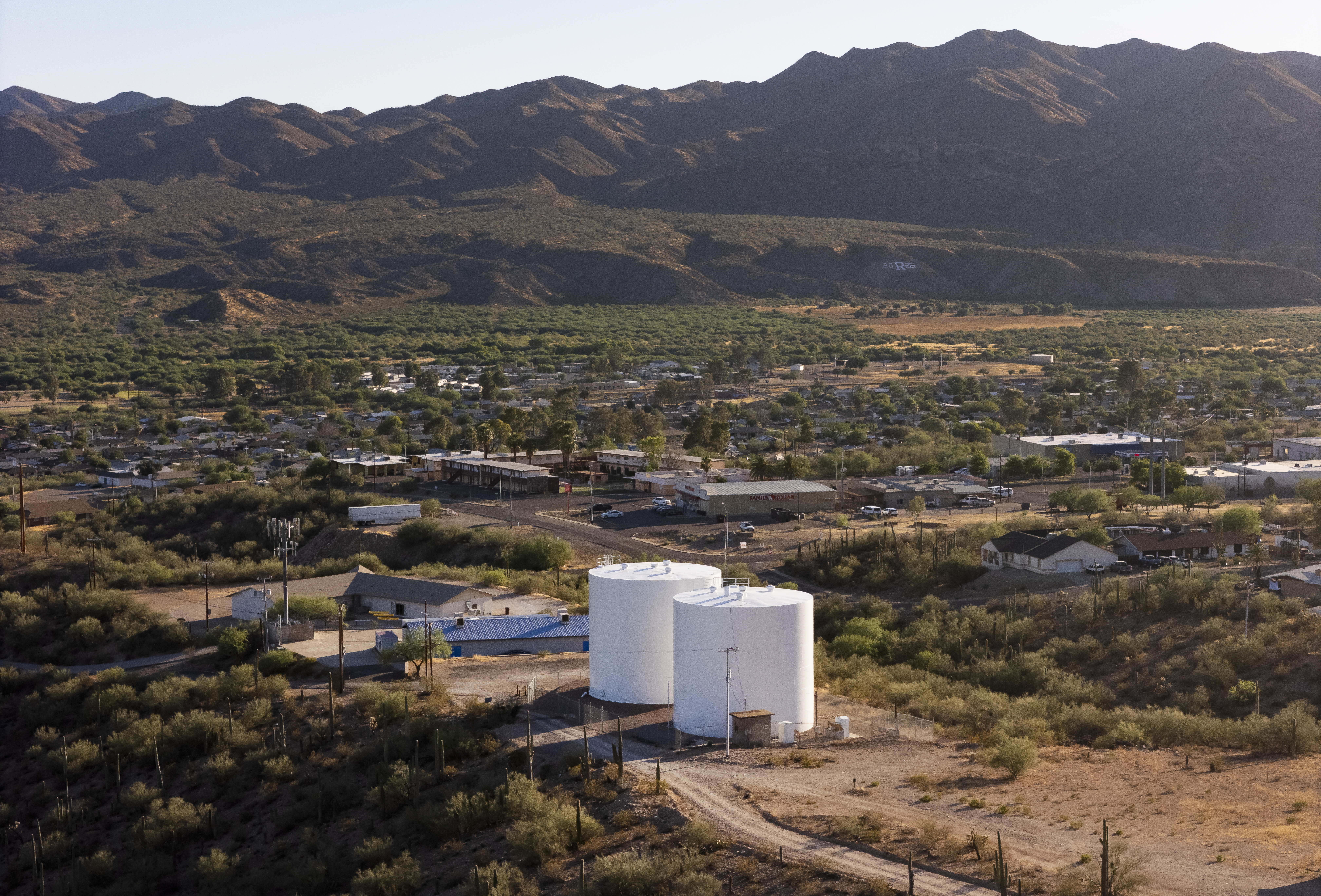 An aerial view shows a pair of water storage tanks on the edge of Kearny, Arizona, on July 1. (Rebecca Noble/For The Washington Post)