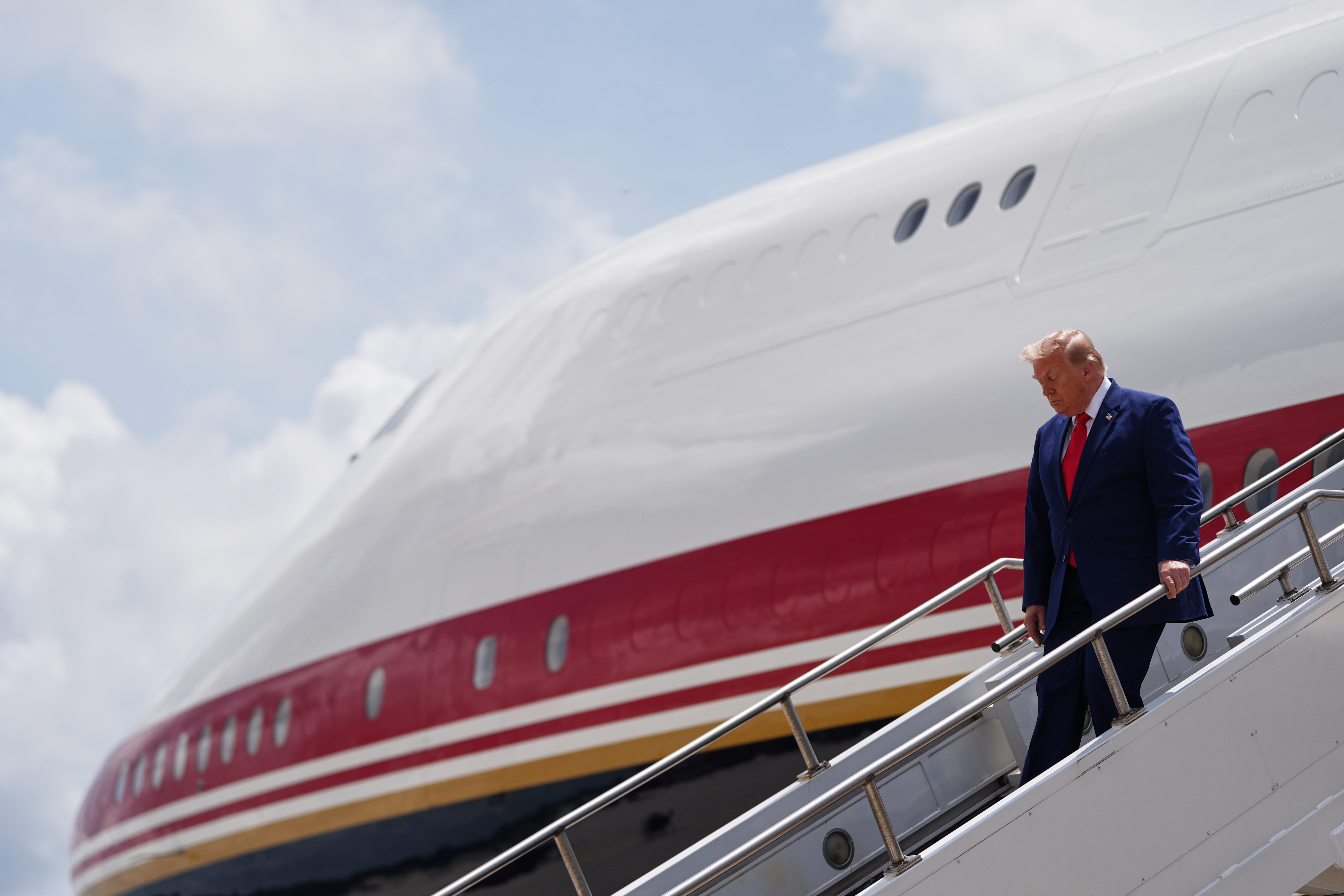 President Donald Trump disembarks Air Force One on Wednesday at Dobbins Air Reserve Base in Georgia. (Julia Demaree Nikhinson/AP Photo/Julia Demaree Nikhinson)