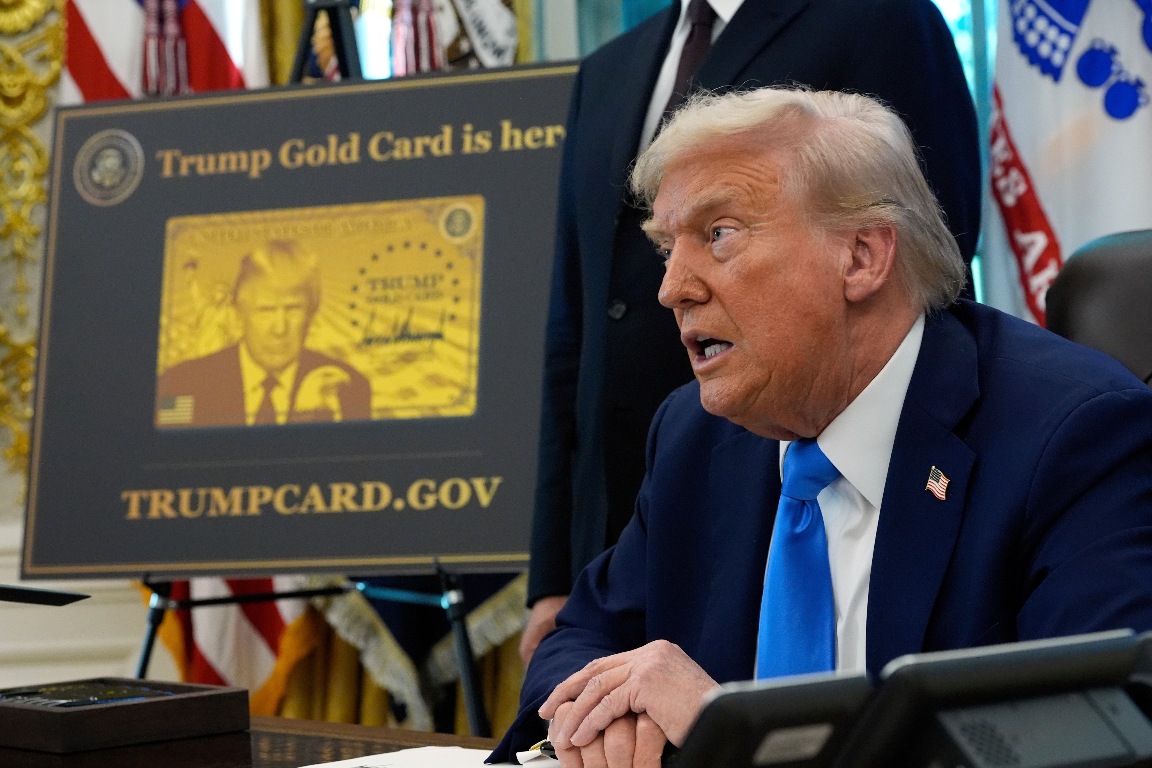 President Donald Trump discusses visa fees in September. (Alex Brandon/AP)