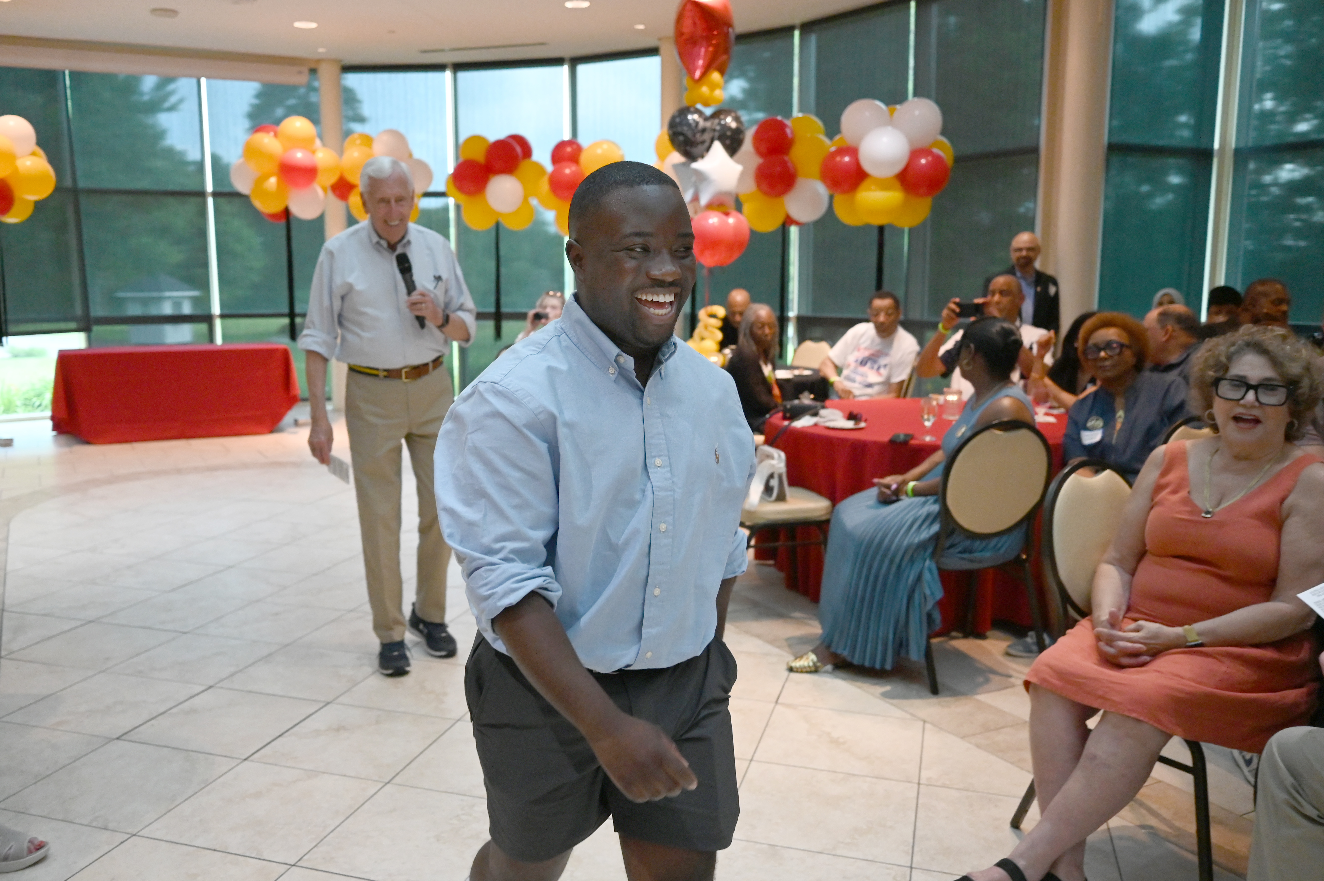 Adrian Boafo, a Maryland state delegate running for Congress, was introduced by Rep. Steny H. Hoyer (D-Maryland), left, at the AmeriPac Bull Roast on June 12 in Mitchellville. (Gail Burton/AP)
