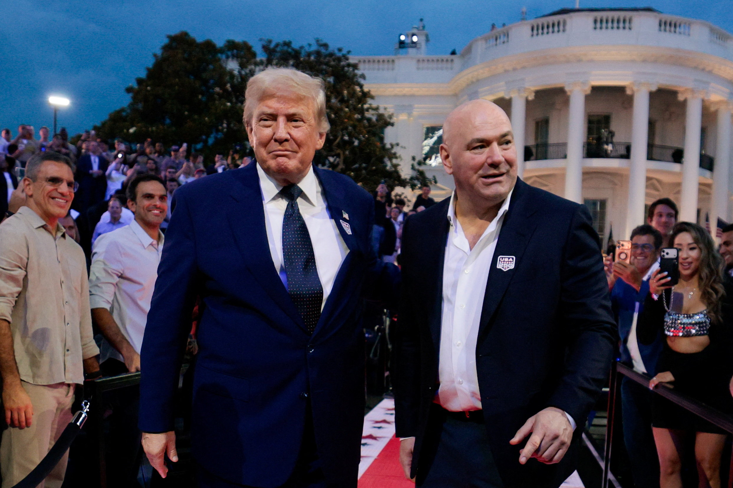 President Donald Trump arrives with UFC president and CEO Dana White. (Evan Vucci/Reuters)