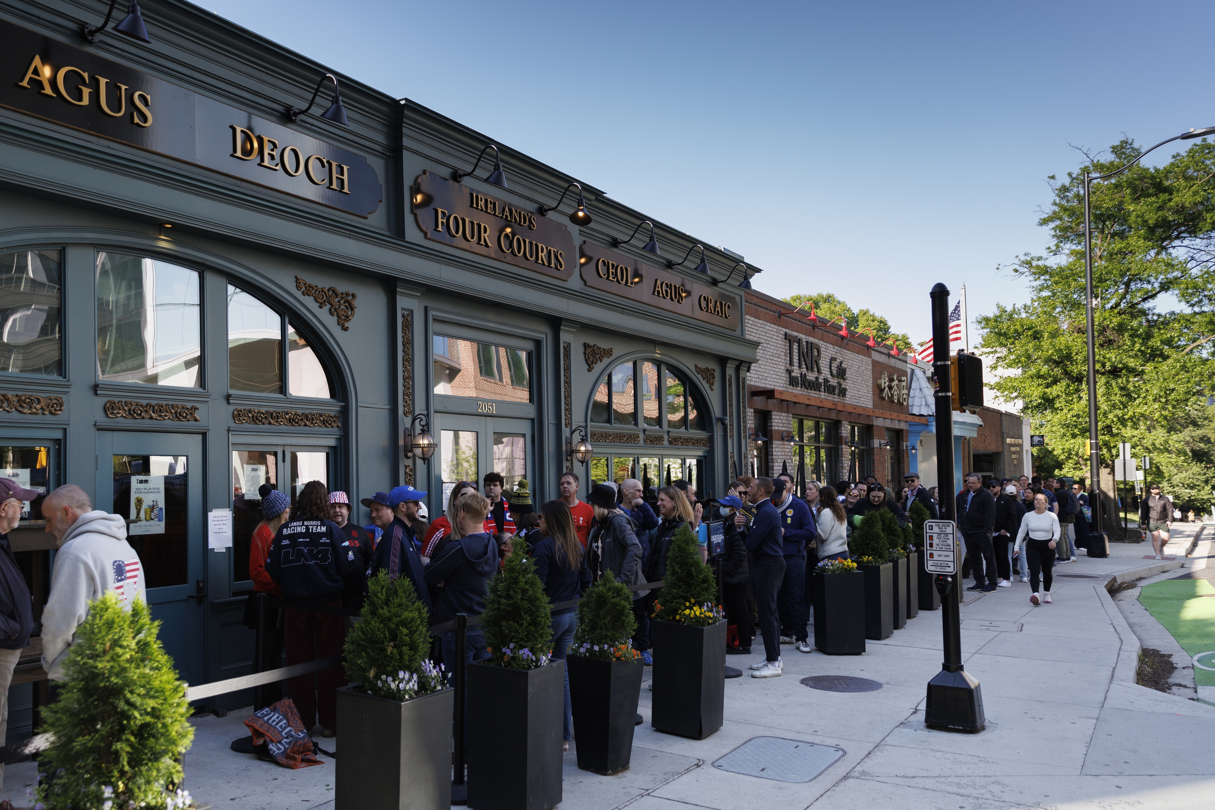 Soccer fans line up outside Ireland’s Four Courts in April. (Tom Brenner/For the Washington Post )