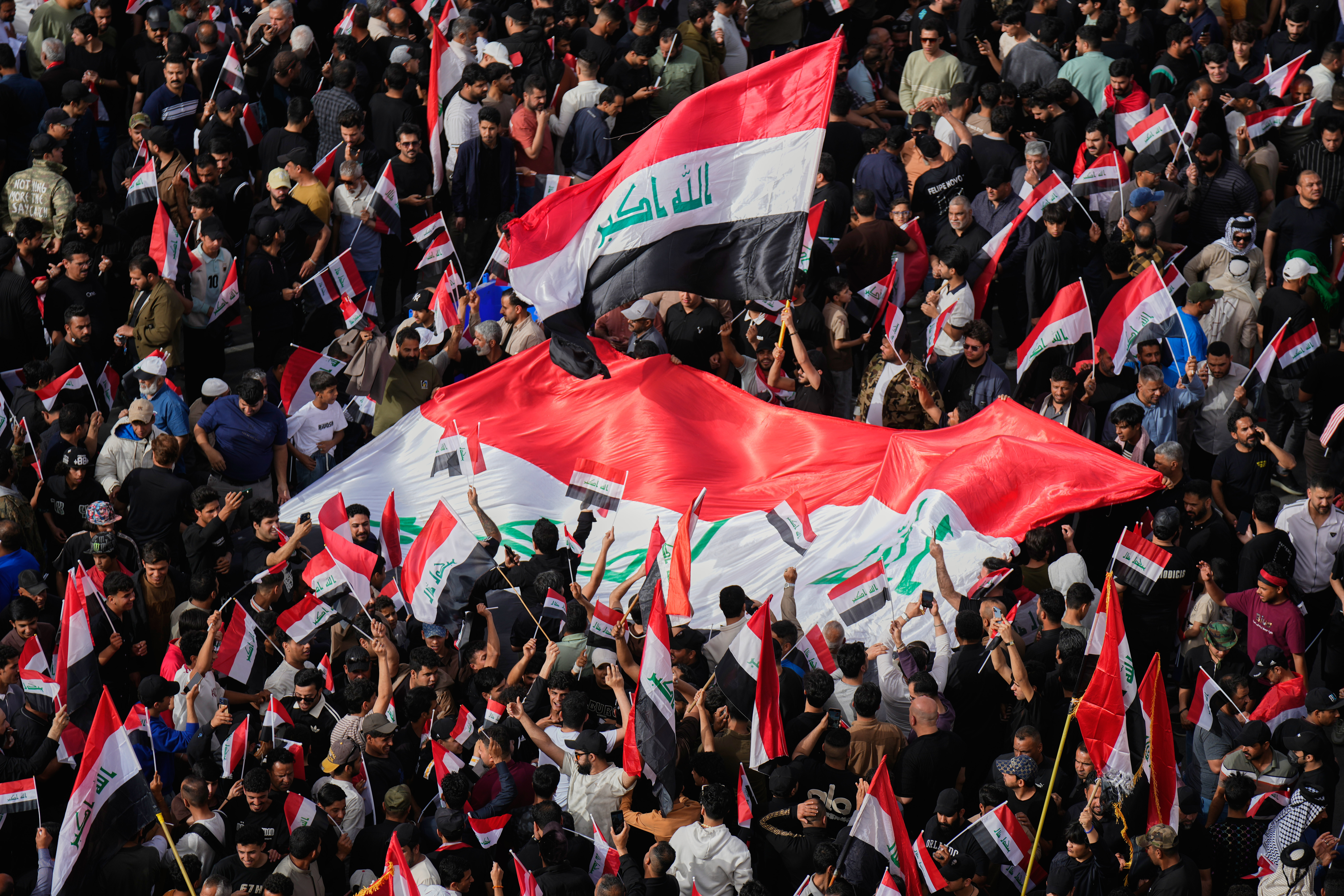 In Baghdad this month, followers of Iraqi Shiite cleric Moqtada al-Sadr protest U.S. and Israeli attacks on Iran. (Hadi Mizban/AP)