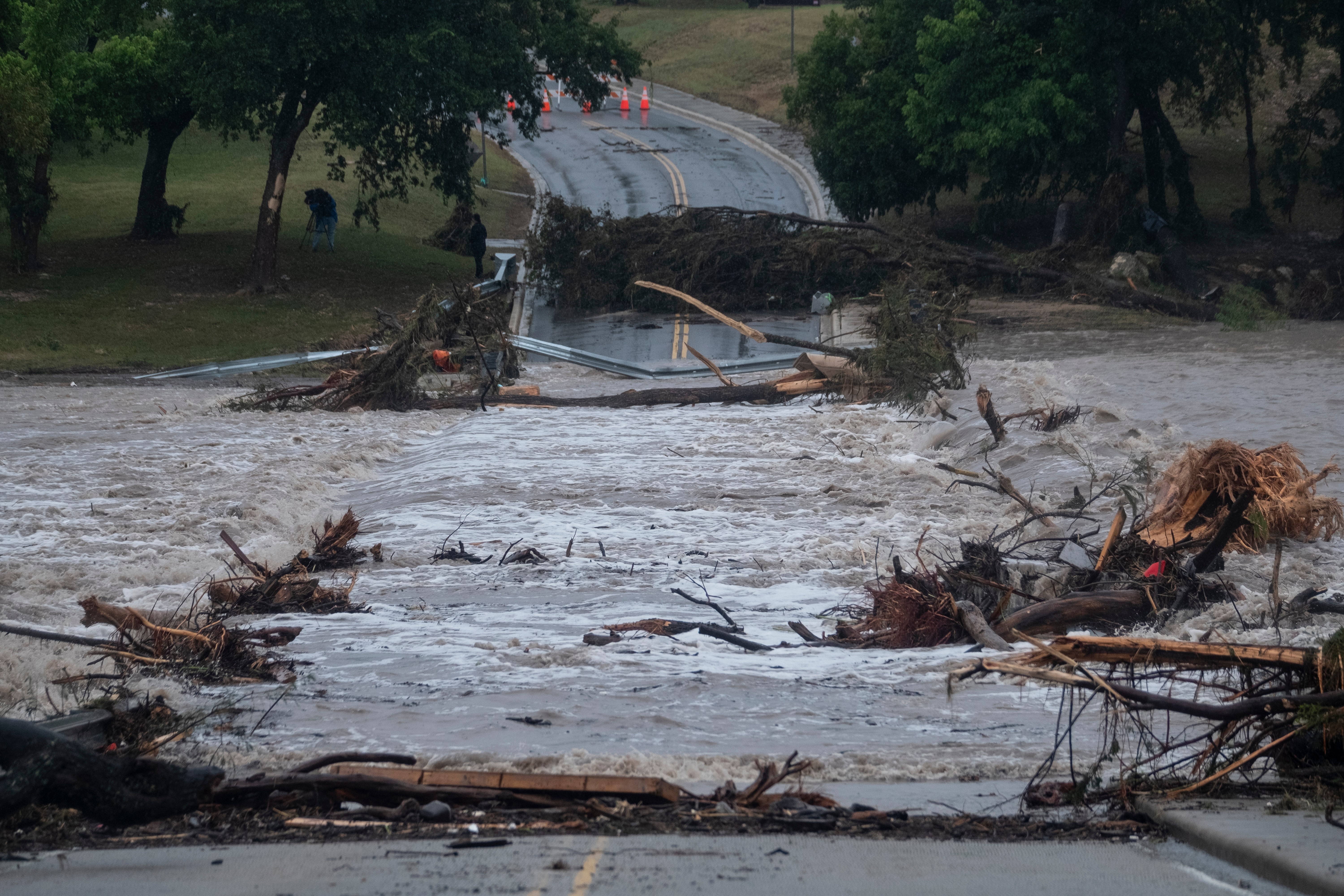 Flooding blocked off G Street along the Guadalupe River in Kerrville, Texas yesterday. (Joel Angel Juarez/AP)