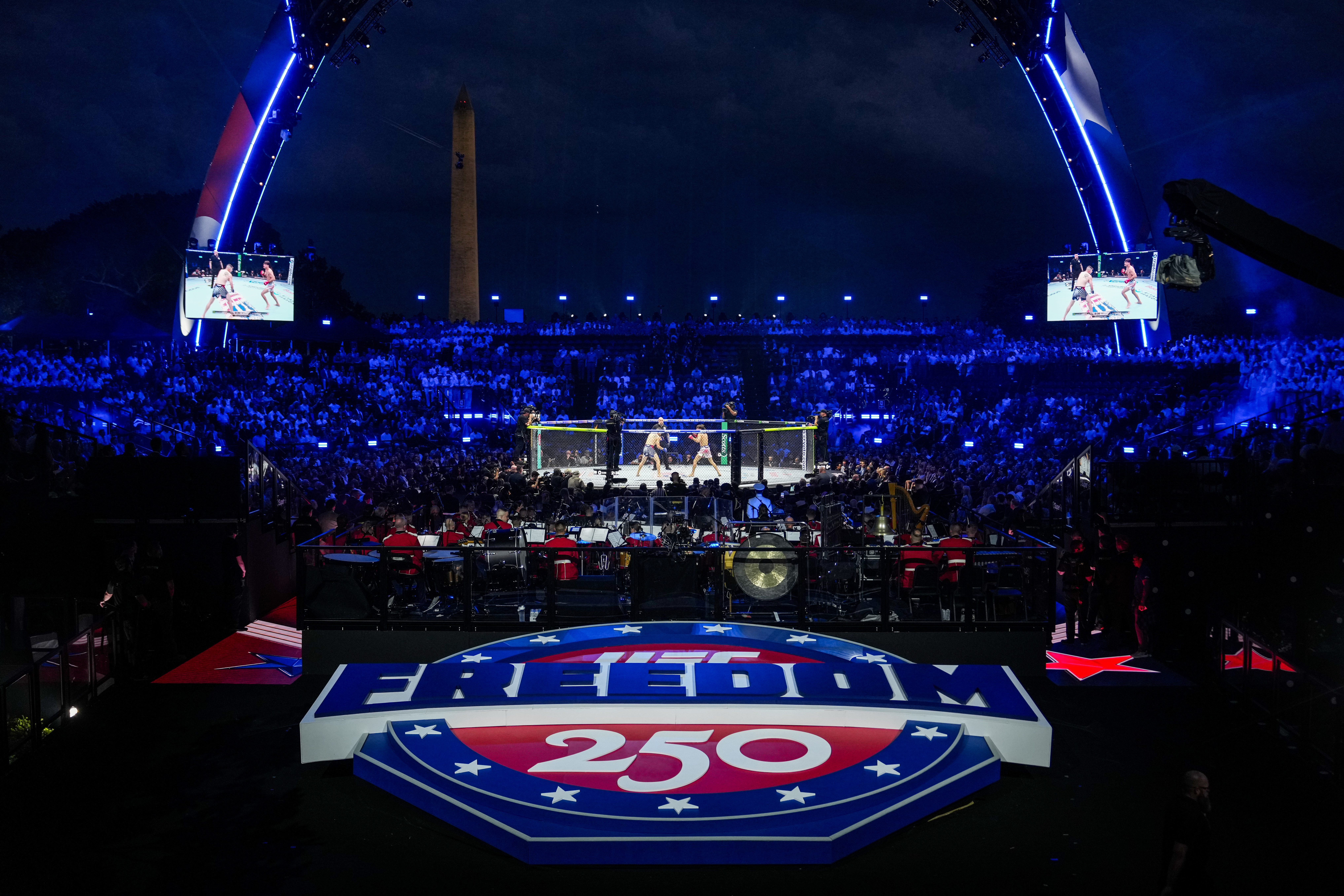Featherweight fighters Diego Lopes and Steve Garcia compete in the ring during the first fight at UFC Freedom 250 on the South Lawn of the White House on Sunday. (Julia Demaree Nikhinson/AP)