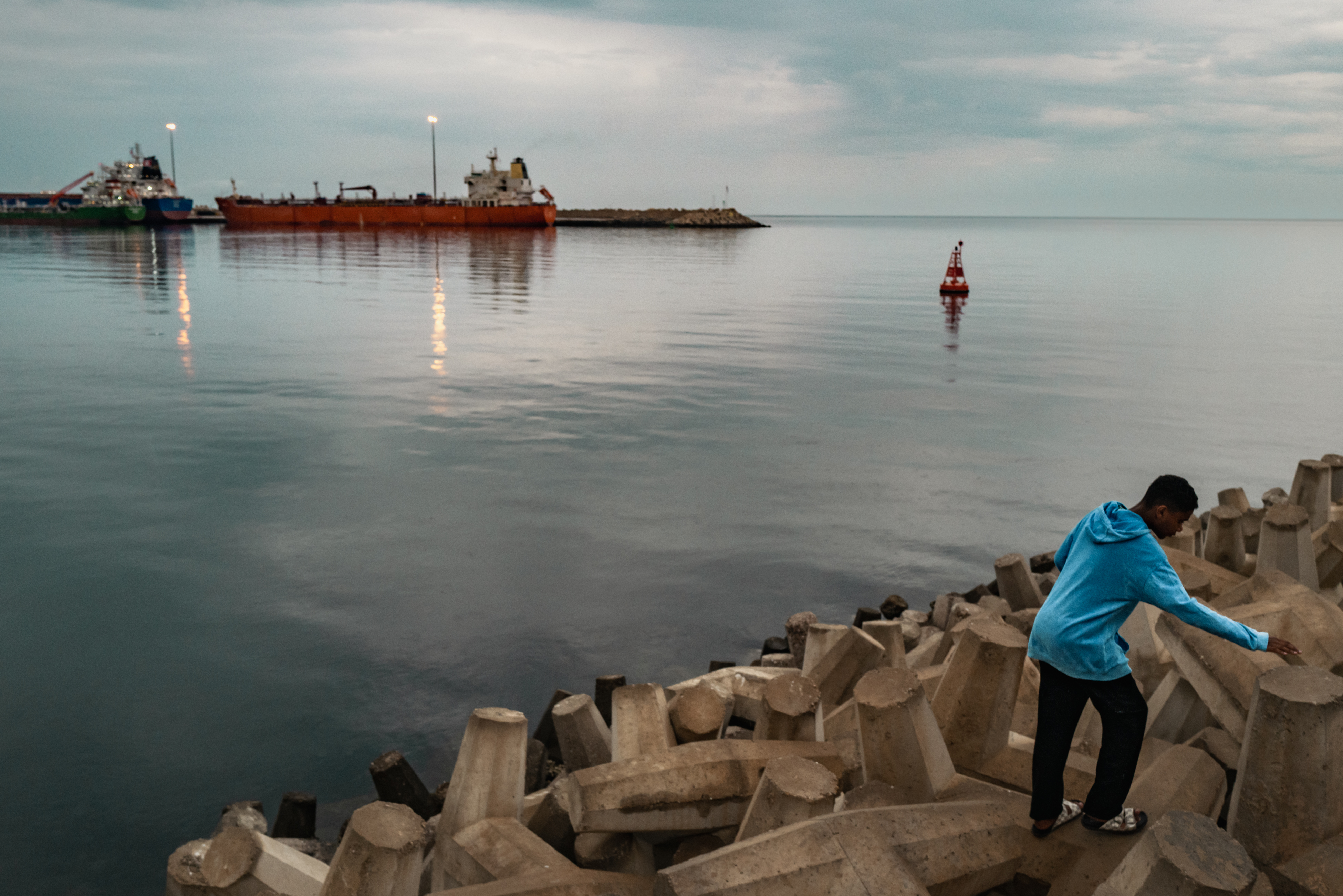 A bulk carrier anchored at a port in Muscat, Oman, on March 23. (Elke Scholiers/Getty Images)