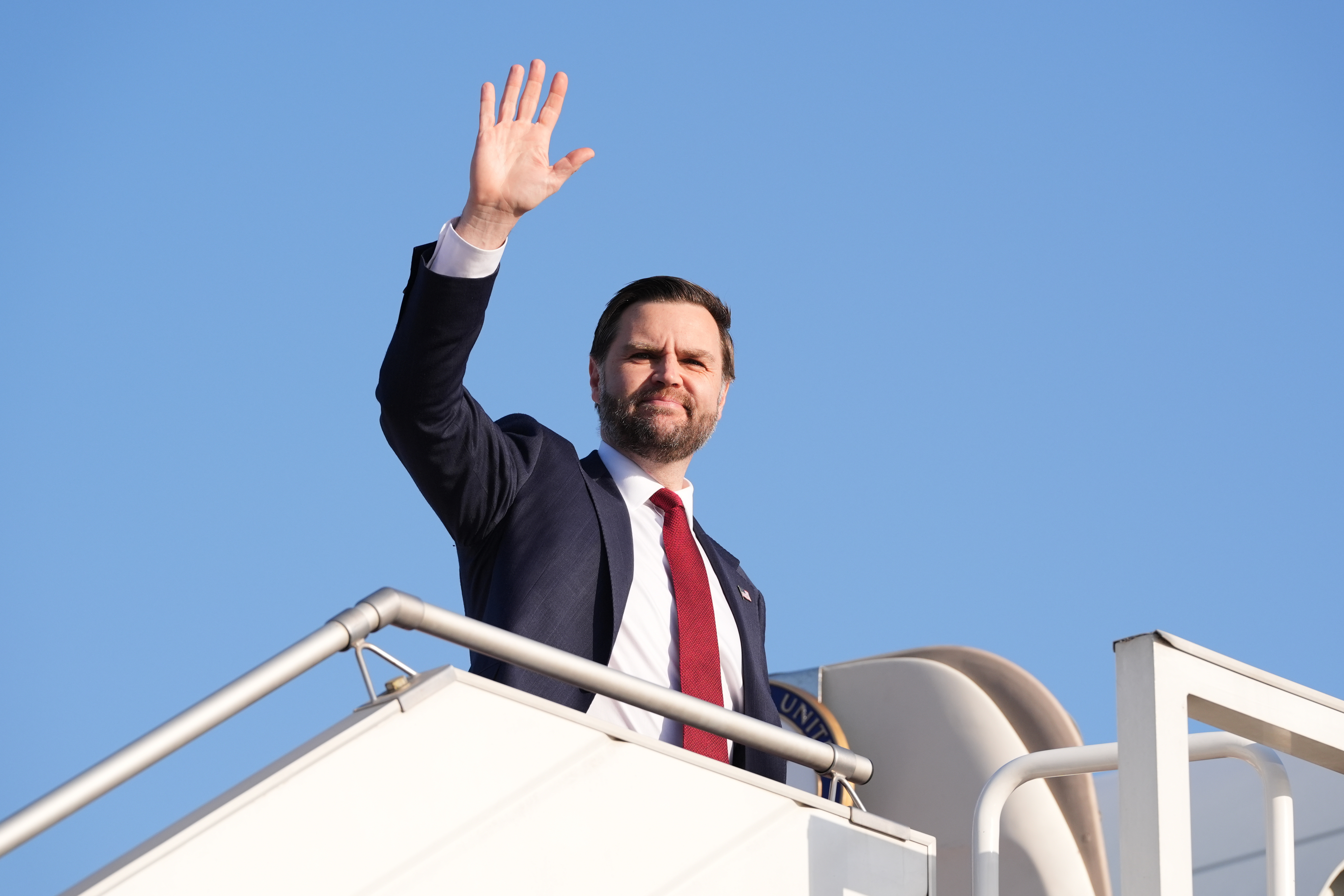 Vice President JD Vance boards Air Force Two after leading talks on the Iran war in Islamabad, Pakistan, on Sunday. (Jacquelyn Martin/AP)