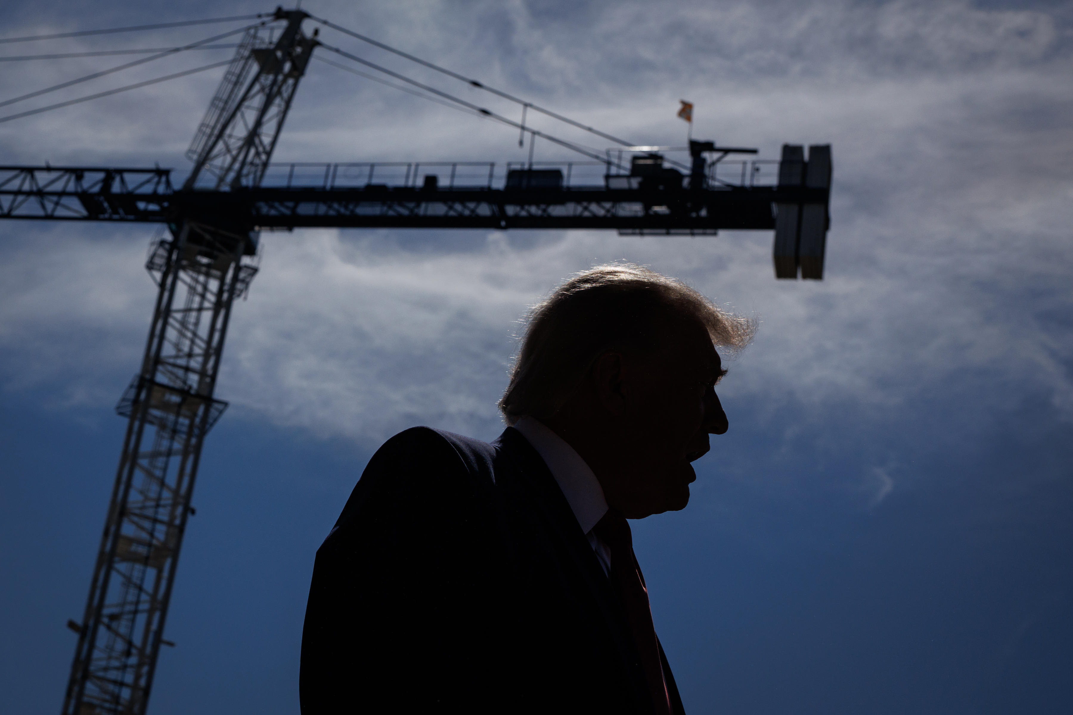 President Donald Trump speaks to the press about construction at the former site of the East Wing, which will become a new White House ballroom, on May 19. (Samuel Corum/Pool/For The Washington Post)
