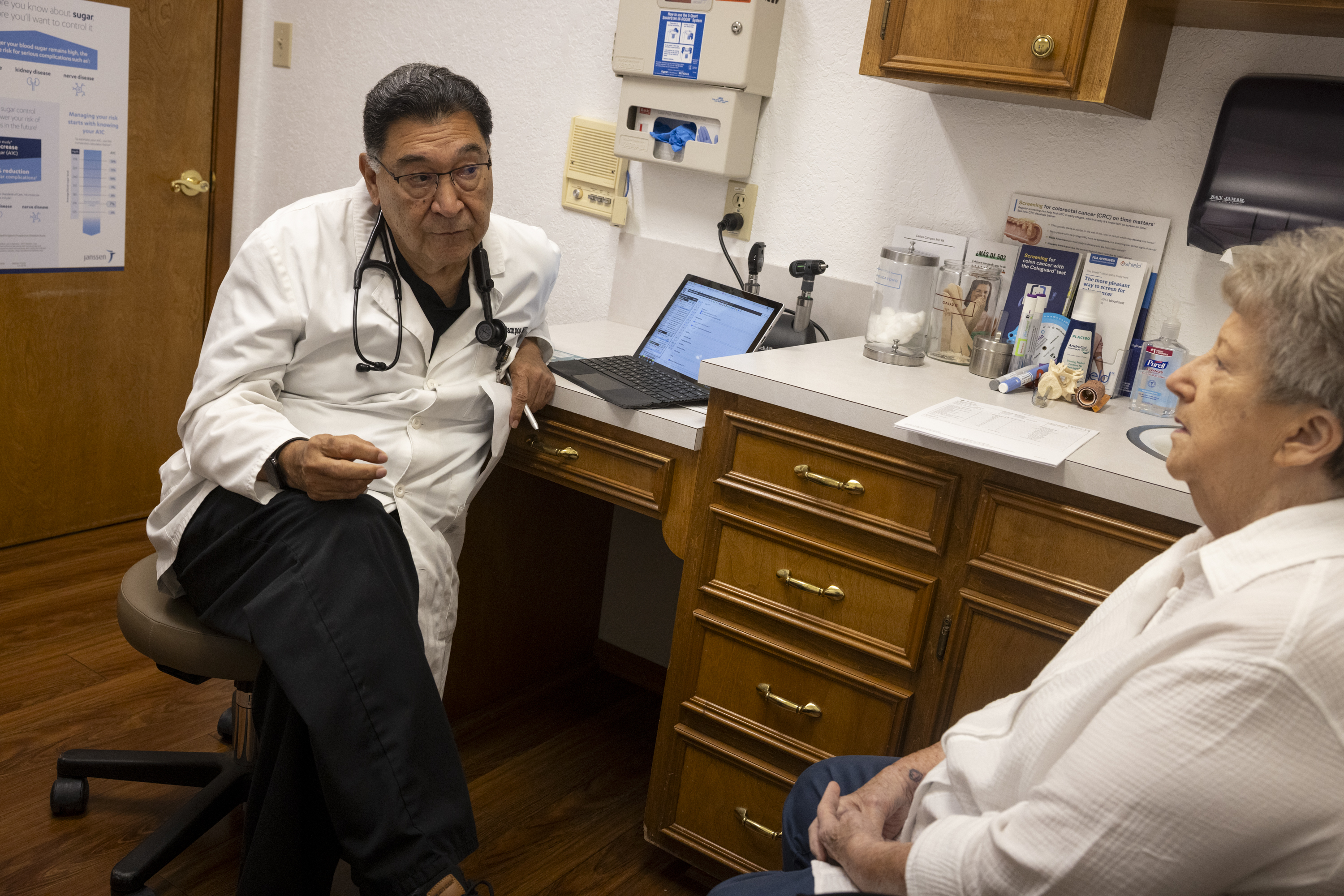Carlos Campos meets with a patient last month in New Braunfels, Texas. (Ilana Panich-Linsman/For The Washington Post)