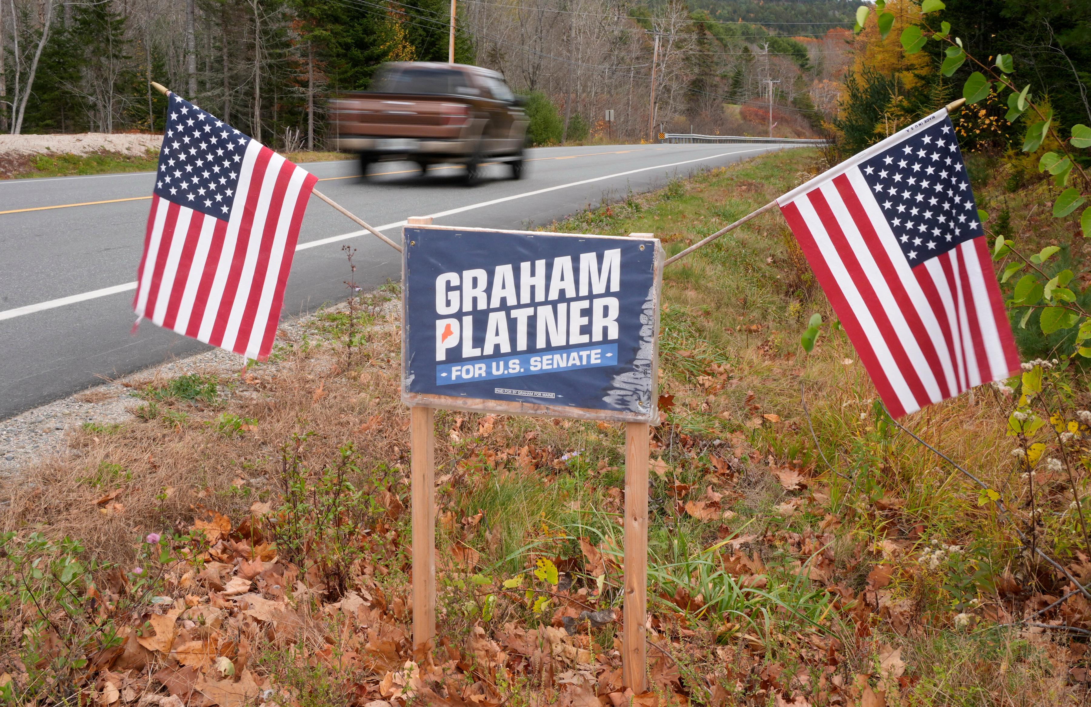 A campaign sign for Graham Platner is seen in his hometown of Sullivan, Maine. On Wednesday, the Democrat suspended his run for U.S. Senate. (Robert F. Bukaty/AP)