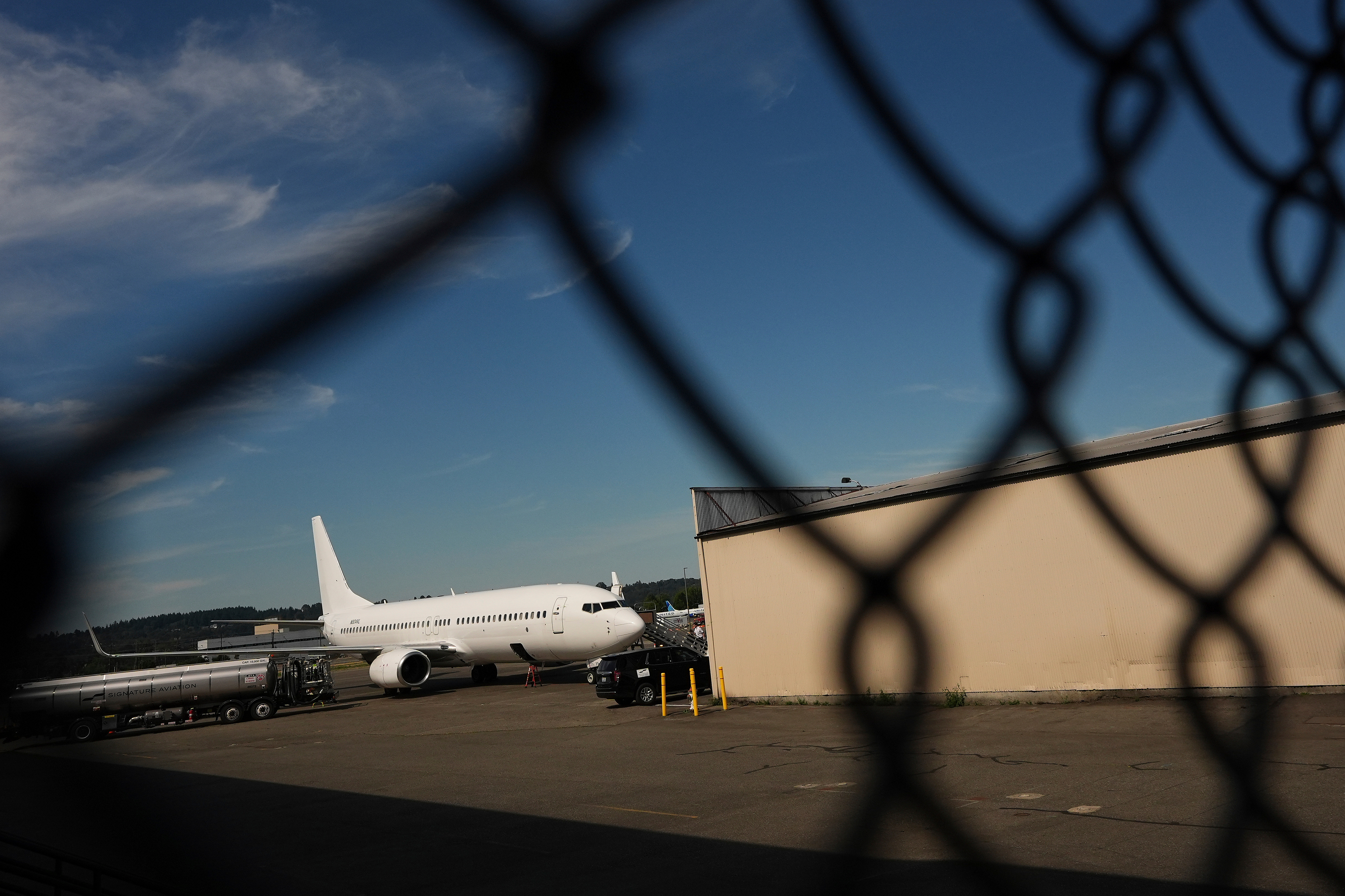 A U.S. Immigration and Customs Enforcement flight operates out of King County International Airport-Boeing Field in Seattle on Aug. 23. (Lindsey Wasson/AP)