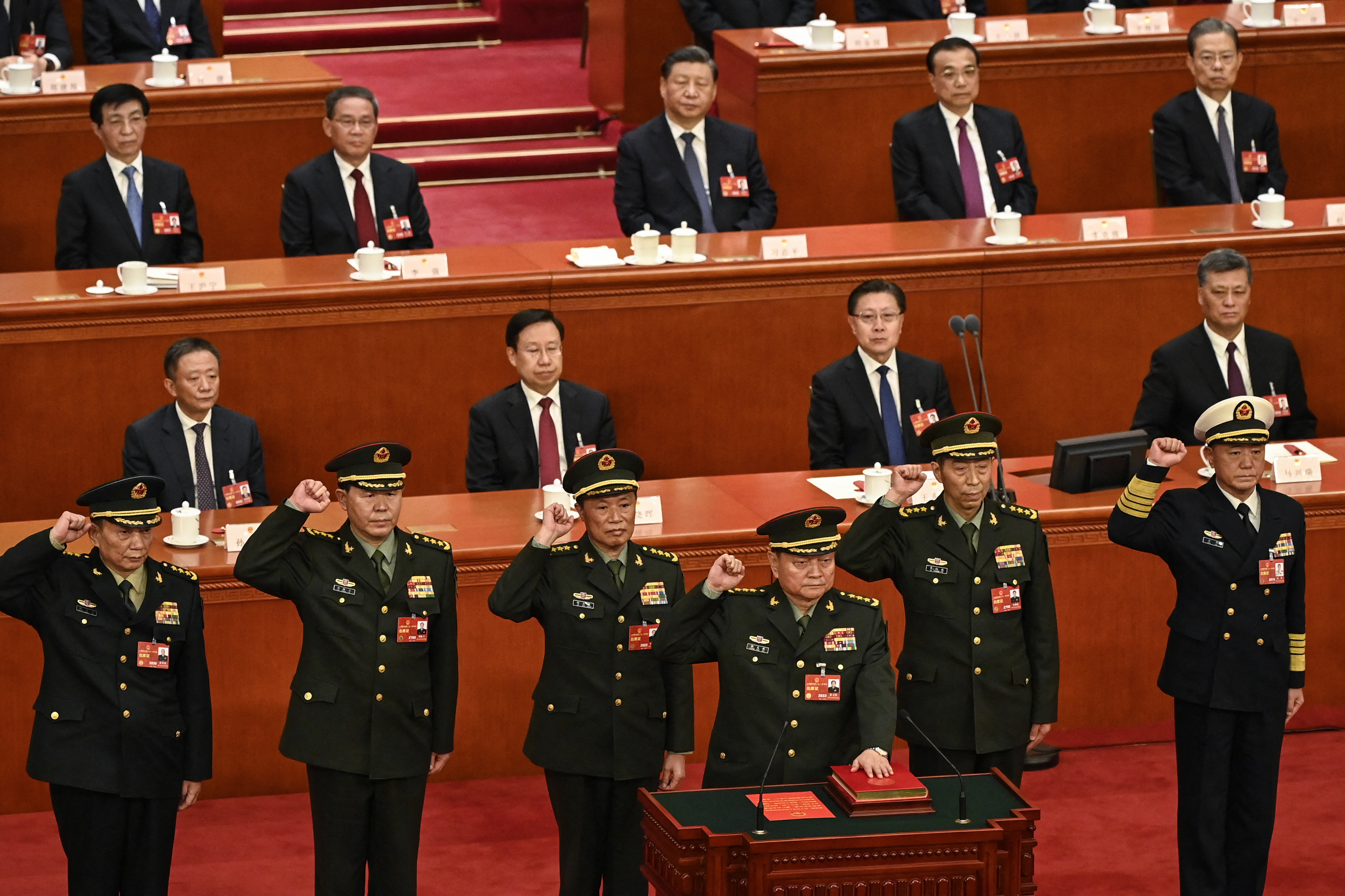 Zhang Youxia, front, is sworn is as vice chairman of China's Central Military Commission in Beijing in 2023. (Greg Baker/Pool/AFP/Getty Images)