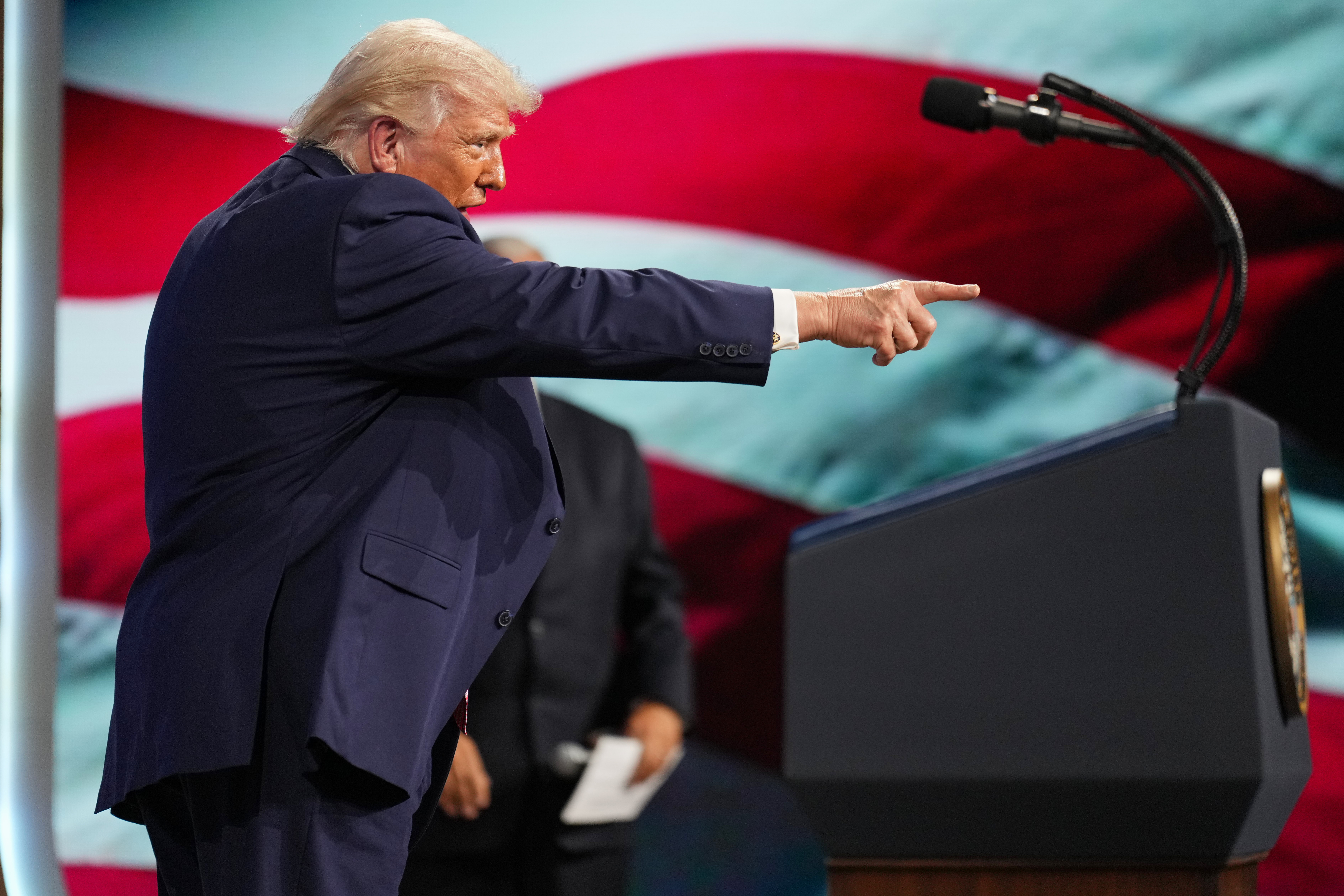 President Donald Trump speaks Friday at the Future Investment Initiative Institute's summit in Miami Beach. (Mark Schiefelbein/AP)