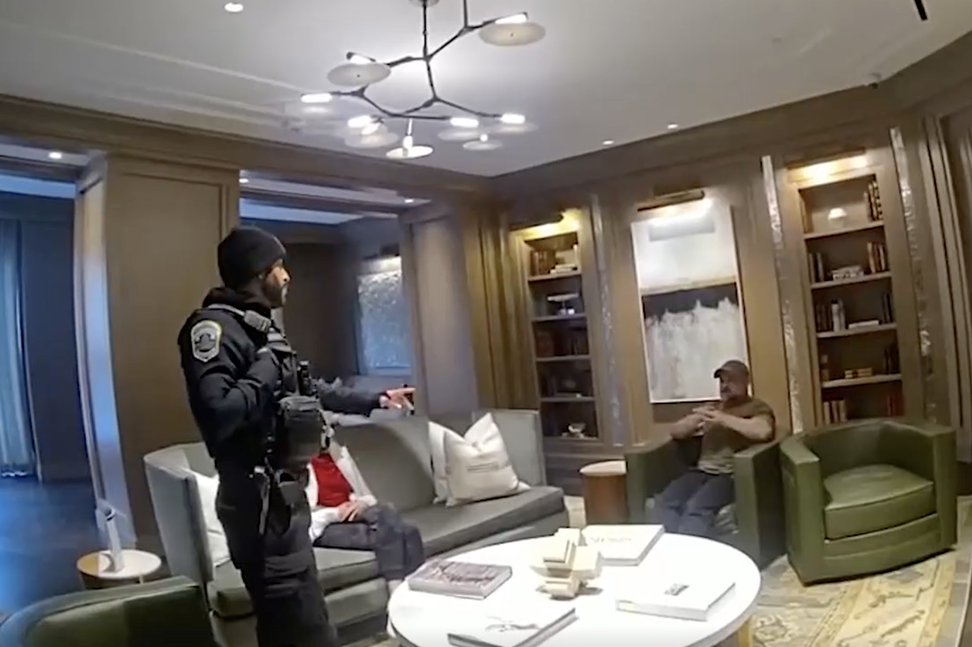 Rep. Cory Mills (R-Florida) sits during an interview with D.C. police on Feb. 19, 2025, after a woman called 911 to report that she had been assaulted by the congressman. The image is from a screenshot of a video obtained by The Post. (D.C. police)