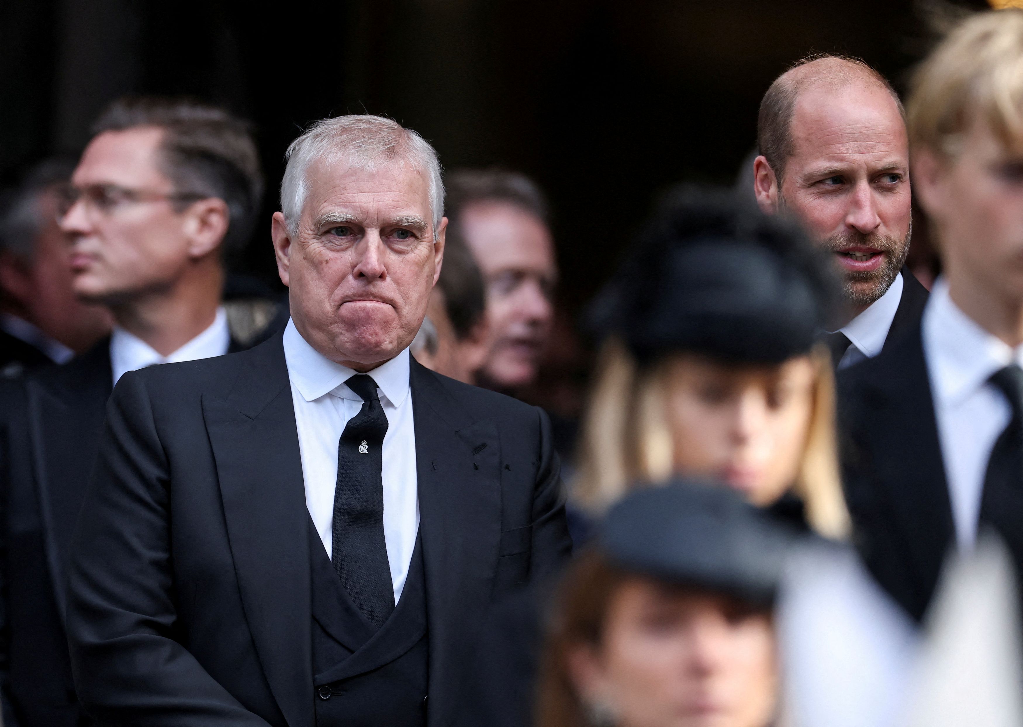 Then-Prince Andrew stands next to Prince William, his nephew, at the end of the funeral of Britain's Katharine, Duchess of Kent, in London on Sept. 16, 2025. (Toby Melville/Reuters)