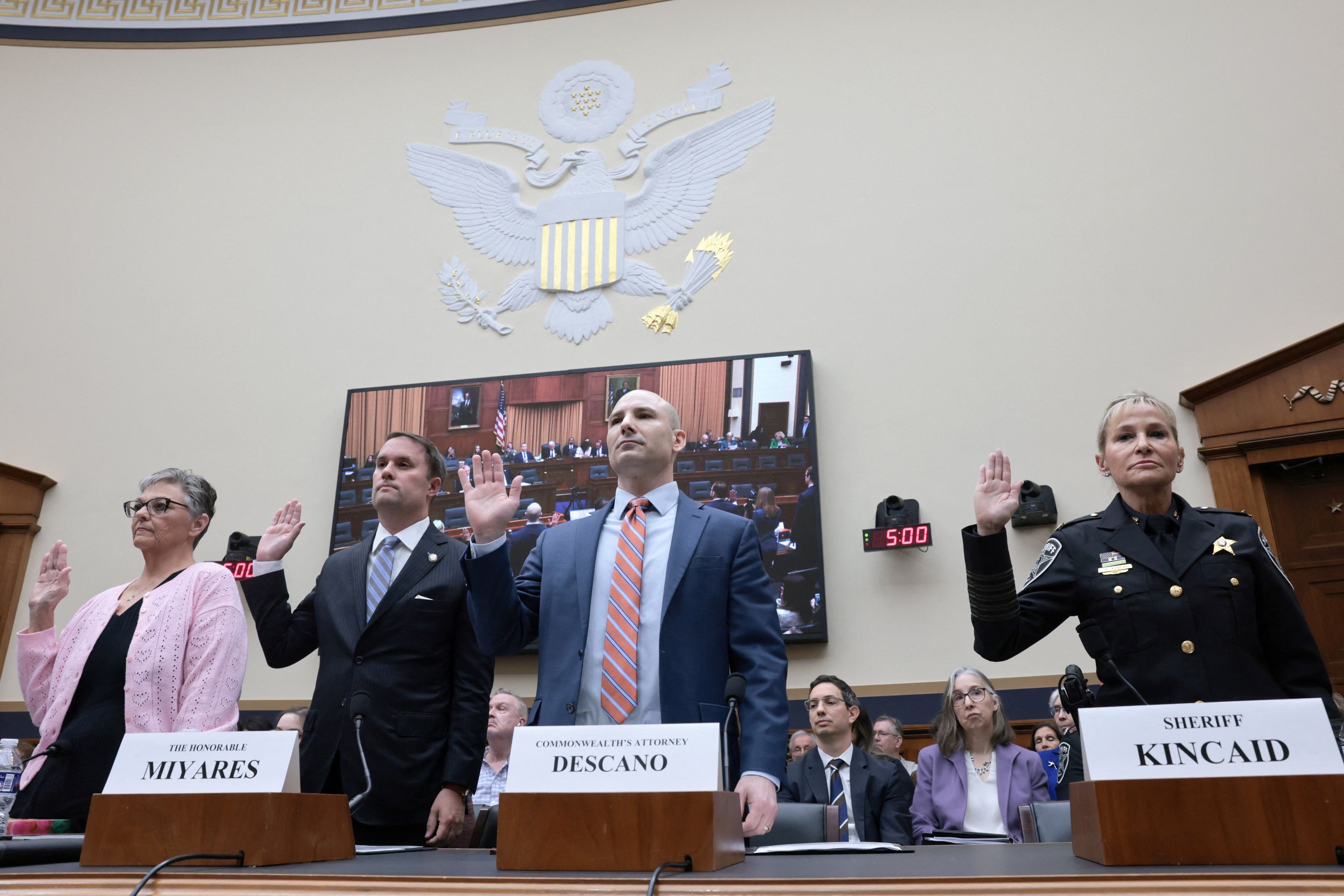 From left, Cheryl Minter, former Virginia attorney general Jason S. Miyares, Fairfax County Commonwealth’s Attorney Stephen Descano and Fairfax County Sheriff Stacey Kincaid are sworn in to testify on Capitol Hill on Thursday. (Jonathan Ernst/Reuters)