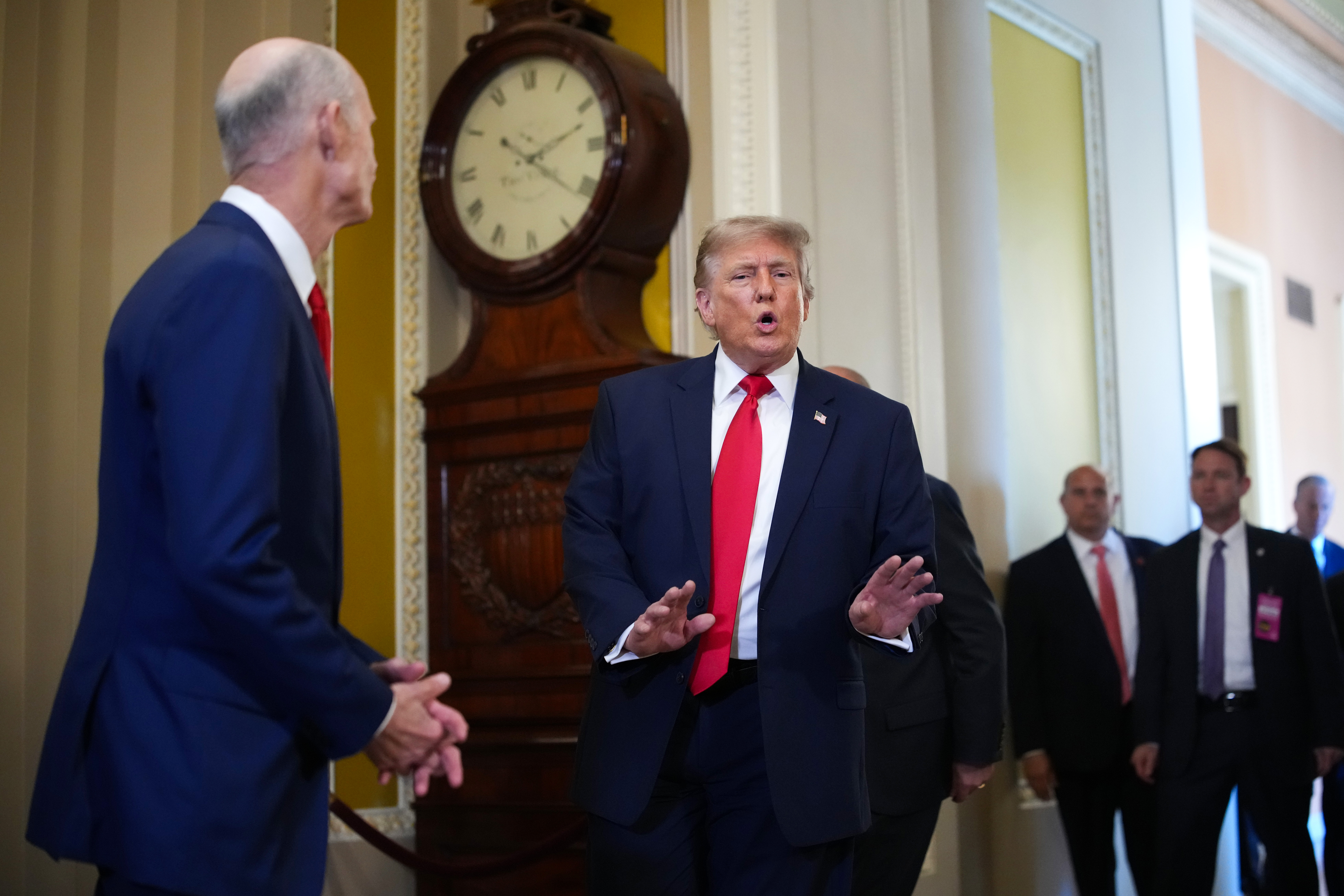President Donald Trump speaks to reporters on Wednesday at the Capitol. (Andrew Harnik/Getty Images)