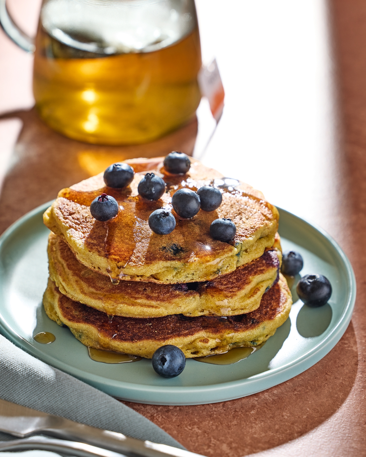 Blueberry Cornmeal Pancakes. (Tom McCorkle/For The Washington Post; food styling by Gina Nistico)